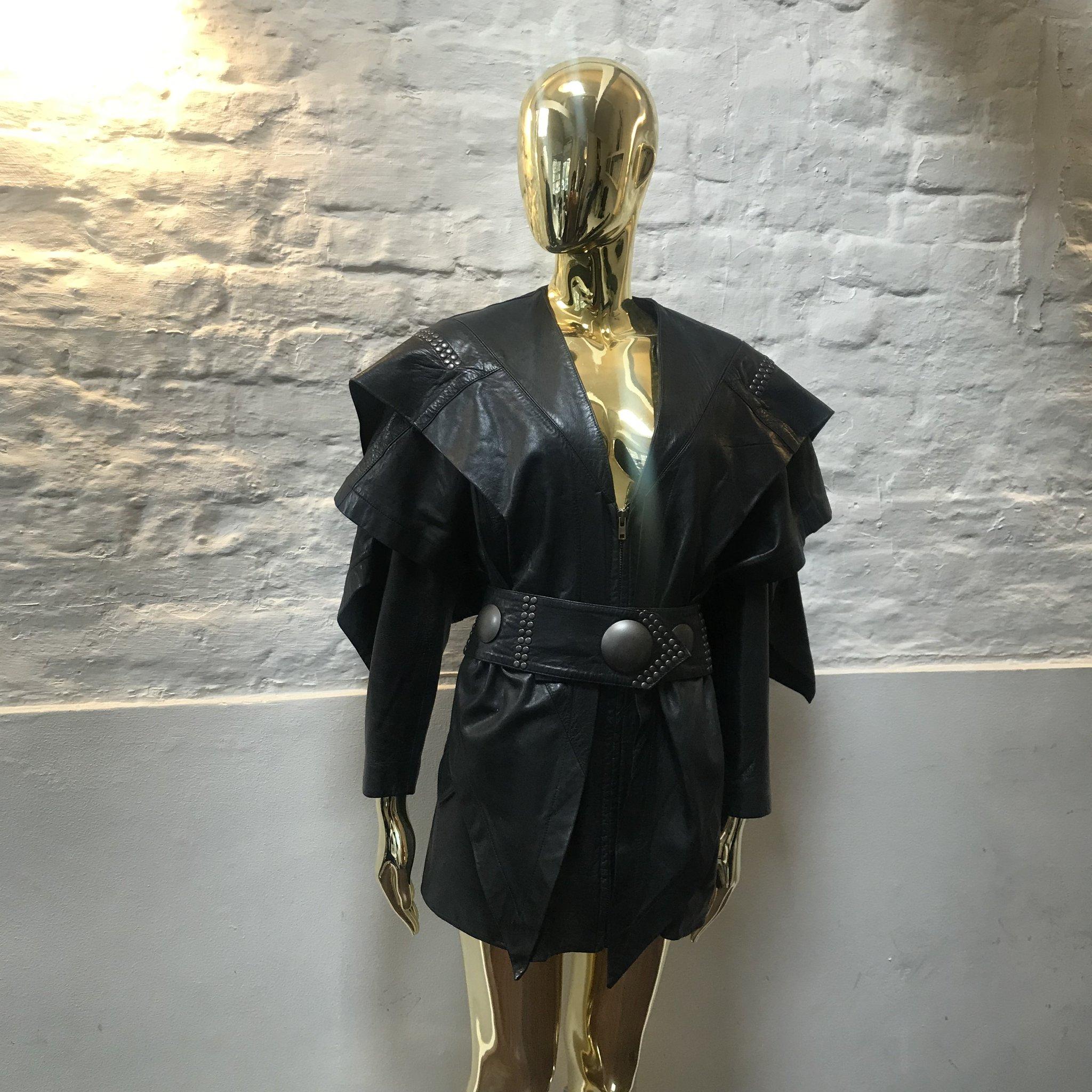 Issey Miyake Leather Belt Dress made in Japan.

Issey Miyake's first collection was launched in New York in 1971, and began to be shown in Paris Fashion Week from Autumn Winter 1973.

From the very beginning to this day, Issey Miyake's design has