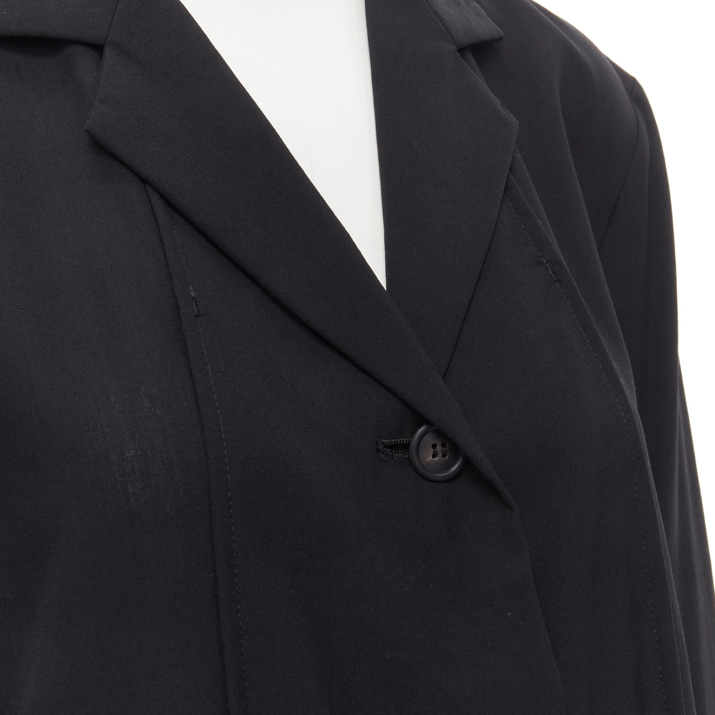 ISSEY MIYAKE lightweight wool nylon flap placket relaxed casual blazer L 
Reference: KELE/A00011 
Brand: Issey Miyake 
Material: Wool 
Color: Black 
Pattern: Solid 
Closure: Button 
Extra Detail: Pleated flap front. 
Made in: Japan 

CONDITION: