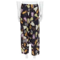 ISSEY MIYAKE MEN multicolour abstract print asymmetric harem pants