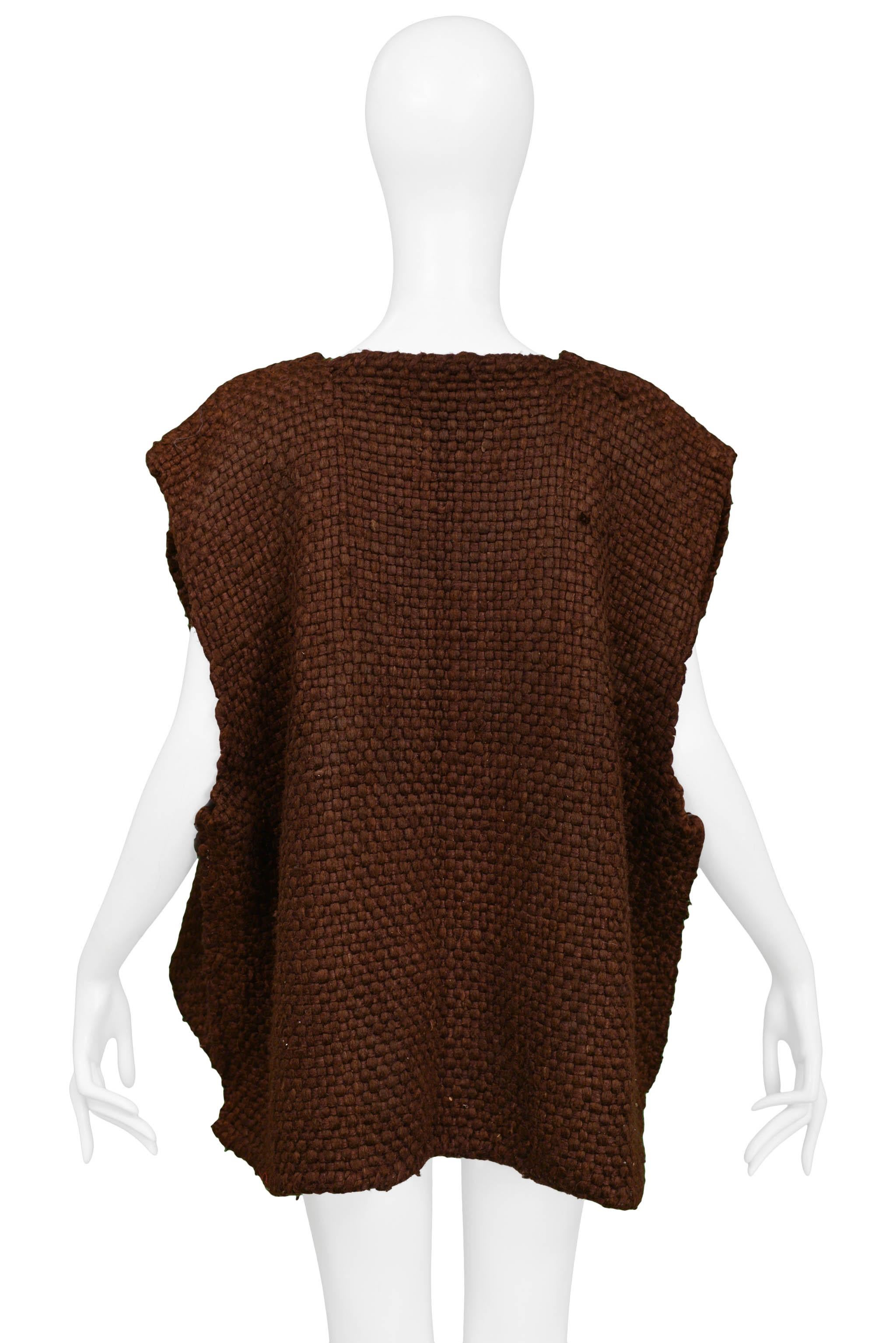 Resurrection Vintage is excited to offer a vintage Issey Miyake oversized brown woven knit vest with draping front panels. 

Issey Miyake
Size: One Size 
Knit
Excellent Vintage Condition
Authenticity Guaranteed