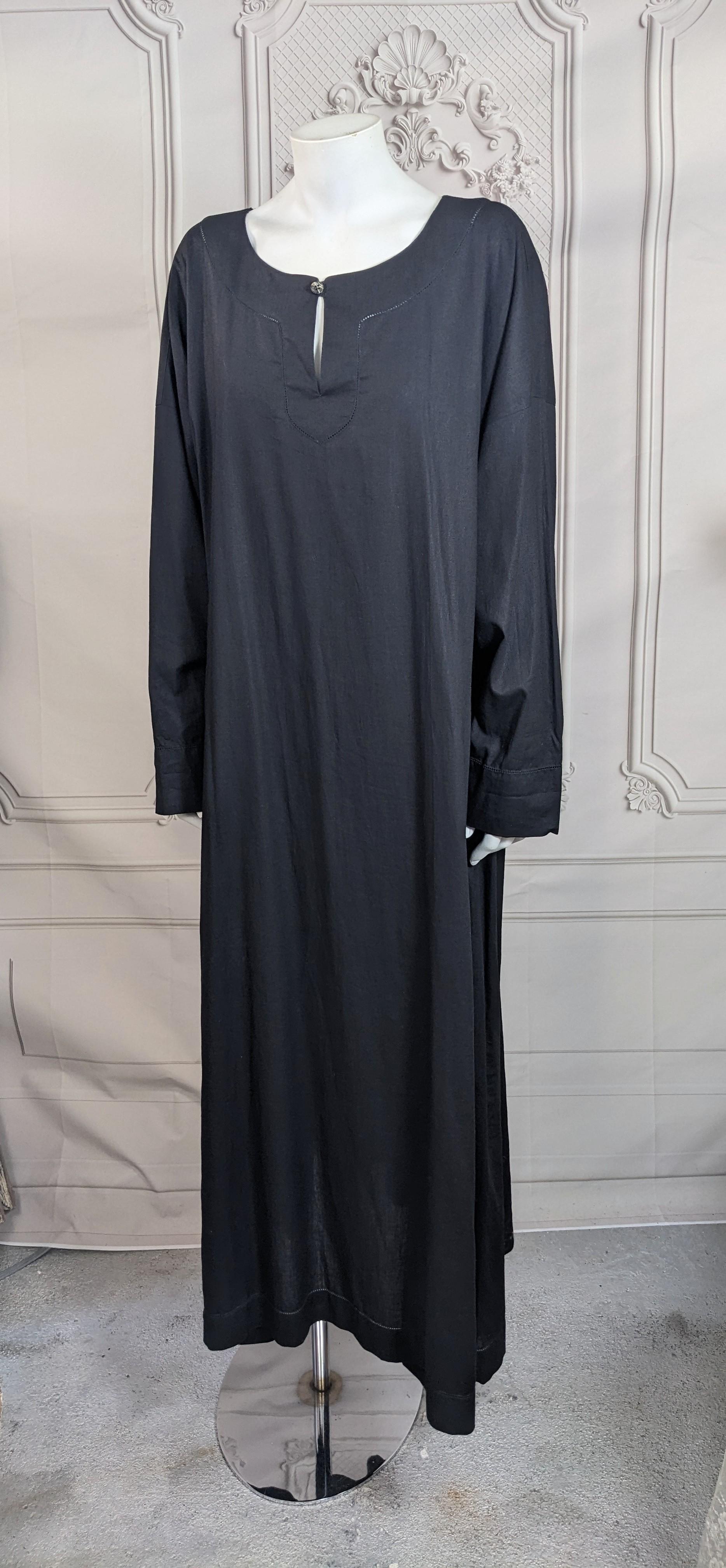 Issey Miyake Plantation, Black Linen Cotton Long Tunic Dress from the 1990's. Simple button neckline with decorative openwork faggoting detail on yoke, front and back. Gently flared shape with diagonal pocket entry. Size: Medium, 1990's Japan. 