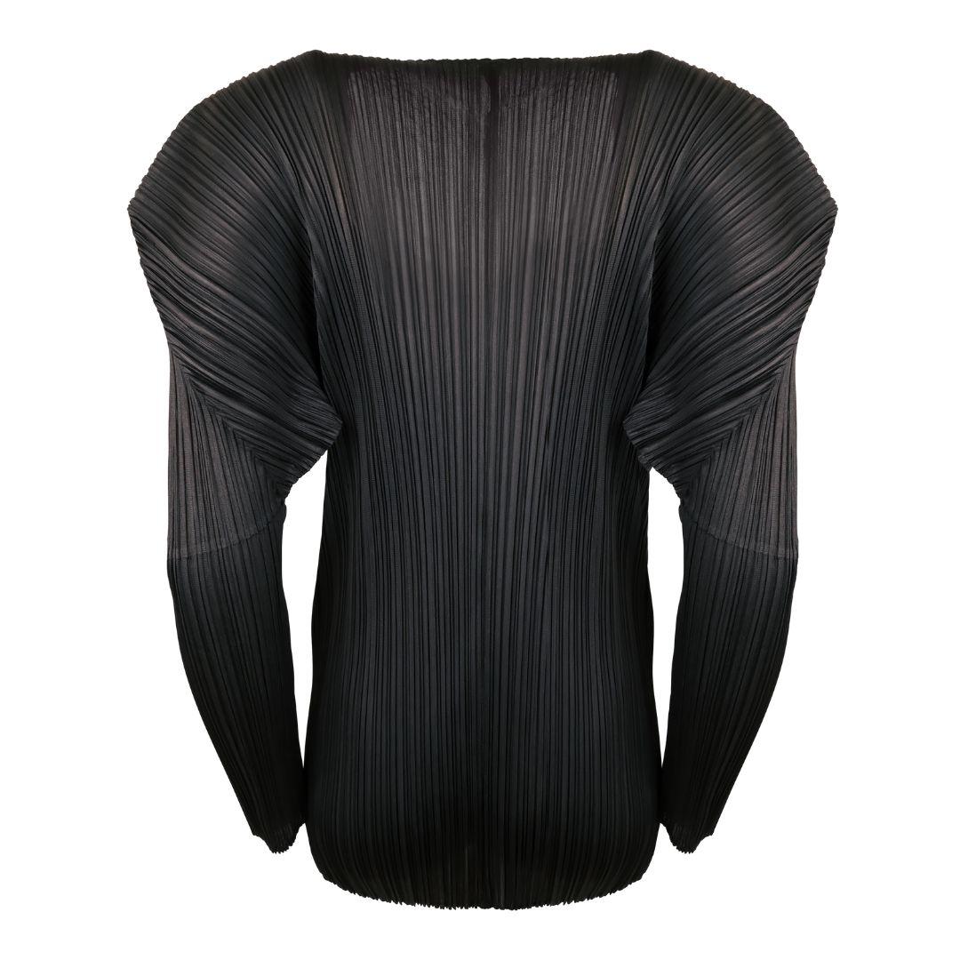 Issey Miyake Pleats Please black micro pleated sculptural cardigan with exaggerated shoulders.

Front panels are curved to create a v-neckline with round edges which taper from the chest outward toward the waistline which adds additional shape and