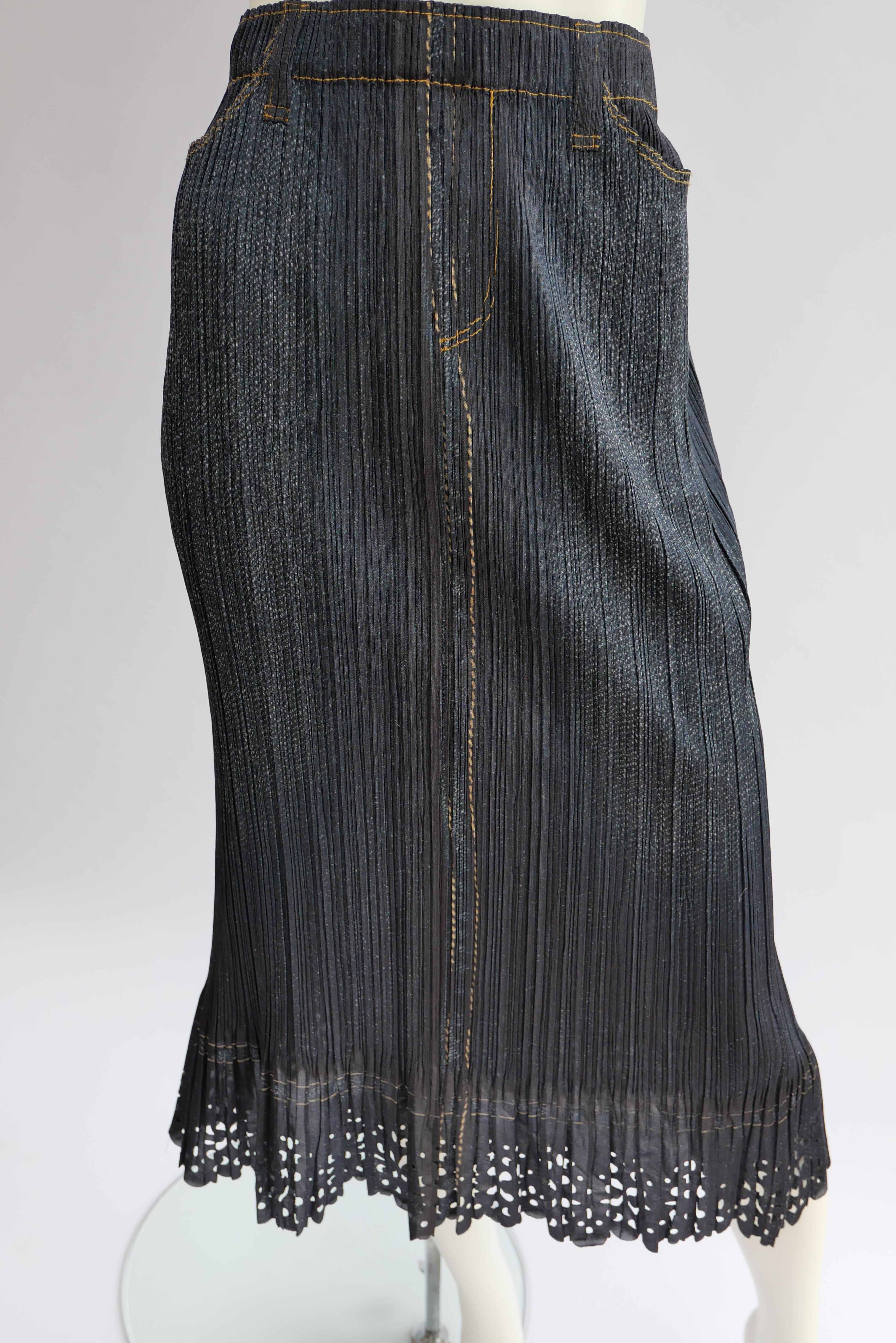 Issey Miyake Pleats Please Denim Printed Skirt 
Issey Miyake pleated skirt with denim print and lace style trim. This skirt is made from the iconic Issey Miyake pleated technology fabric. The material is stretchy so it is versatile in size. 
this