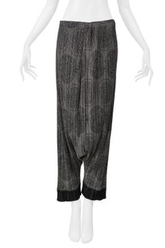 Issey Miyake Pleats Please Grey Harem Pants With Medallion Print And Black Cuffs