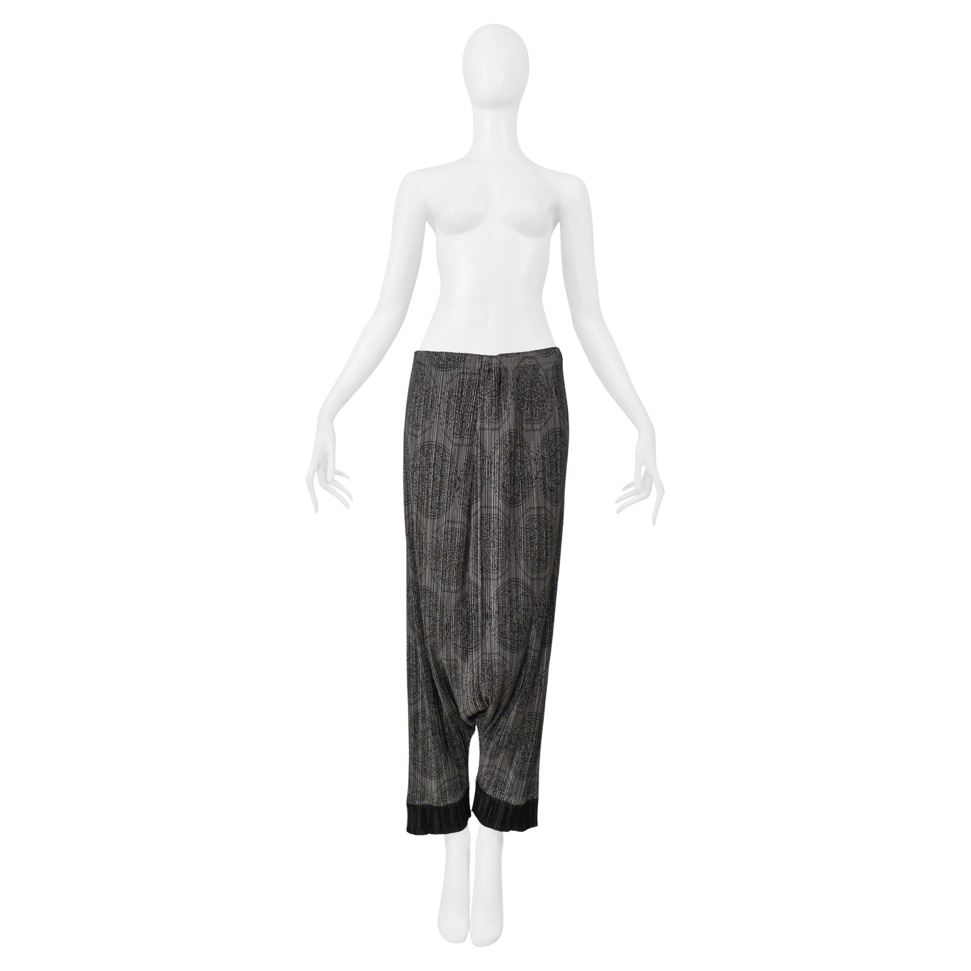 Issey Miyake Pleats Please Grey Harem Pants With Medallion Print And Black Cuffs en venta