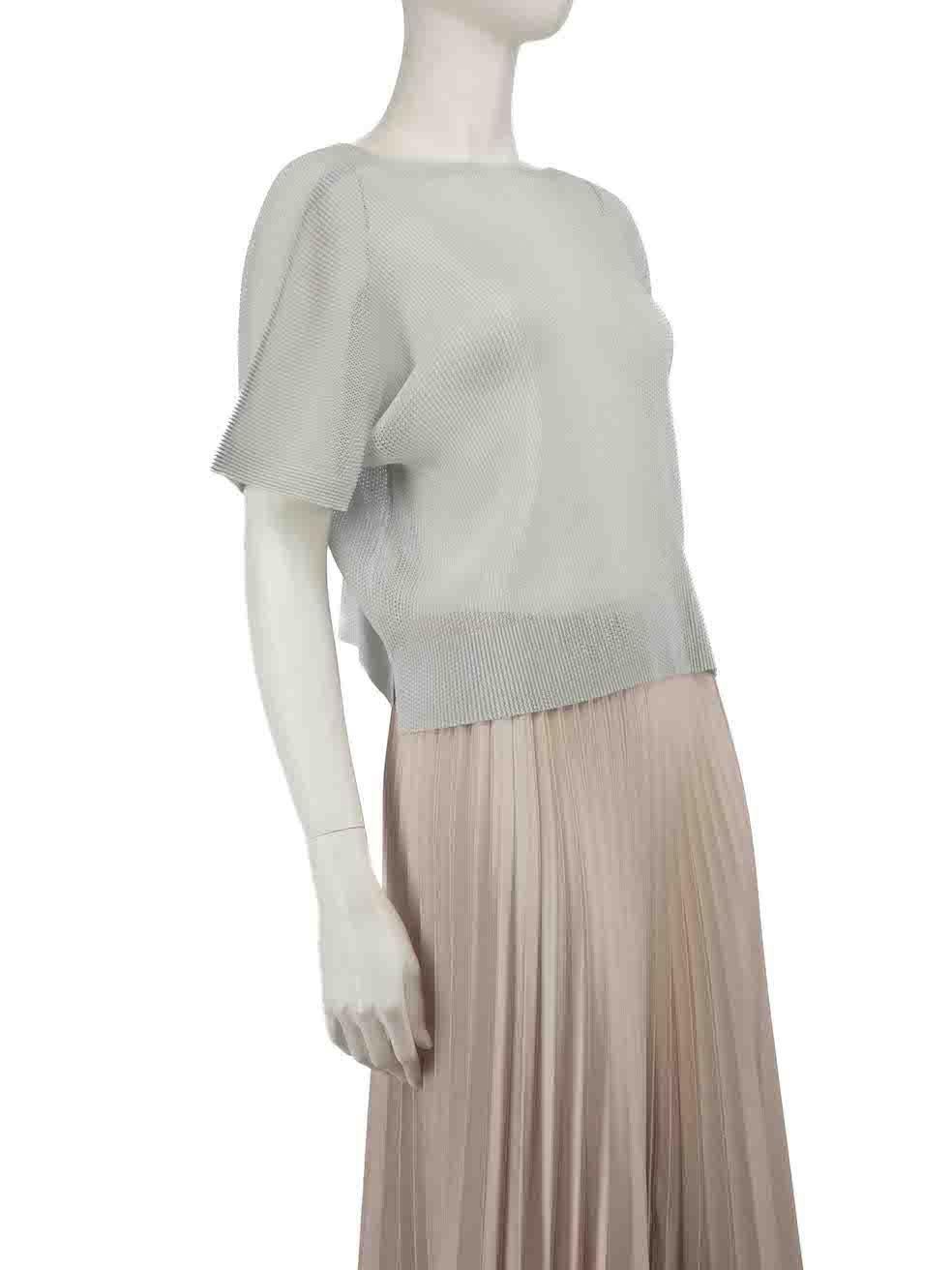 CONDITION is Never worn. No visible wear to top is evident on this new Pleats Please by Issey Miyake designer resale item.
 
 
 
 Details
 
 
 Grey
 
 Polyester
 
 Short sleeves top
 
 Mesh and sheer
 
 Round neckline
 
 Stretchy
 
 
 
 
 
 Made in