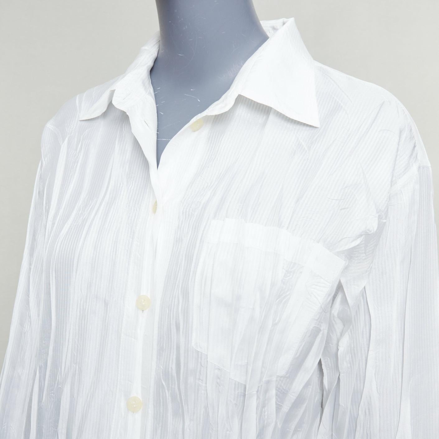 ISSEY MIYAKE Pleats Please white plisse pocketed shirt JP4 XL
Reference: PRWU/A00159
Brand: Issey Miyake
Collection: Pleats Please
Material: Polyester
Color: White
Pattern: Solid
Closure: Button
Made in: Japan

CONDITION:
Condition: Excellent, this