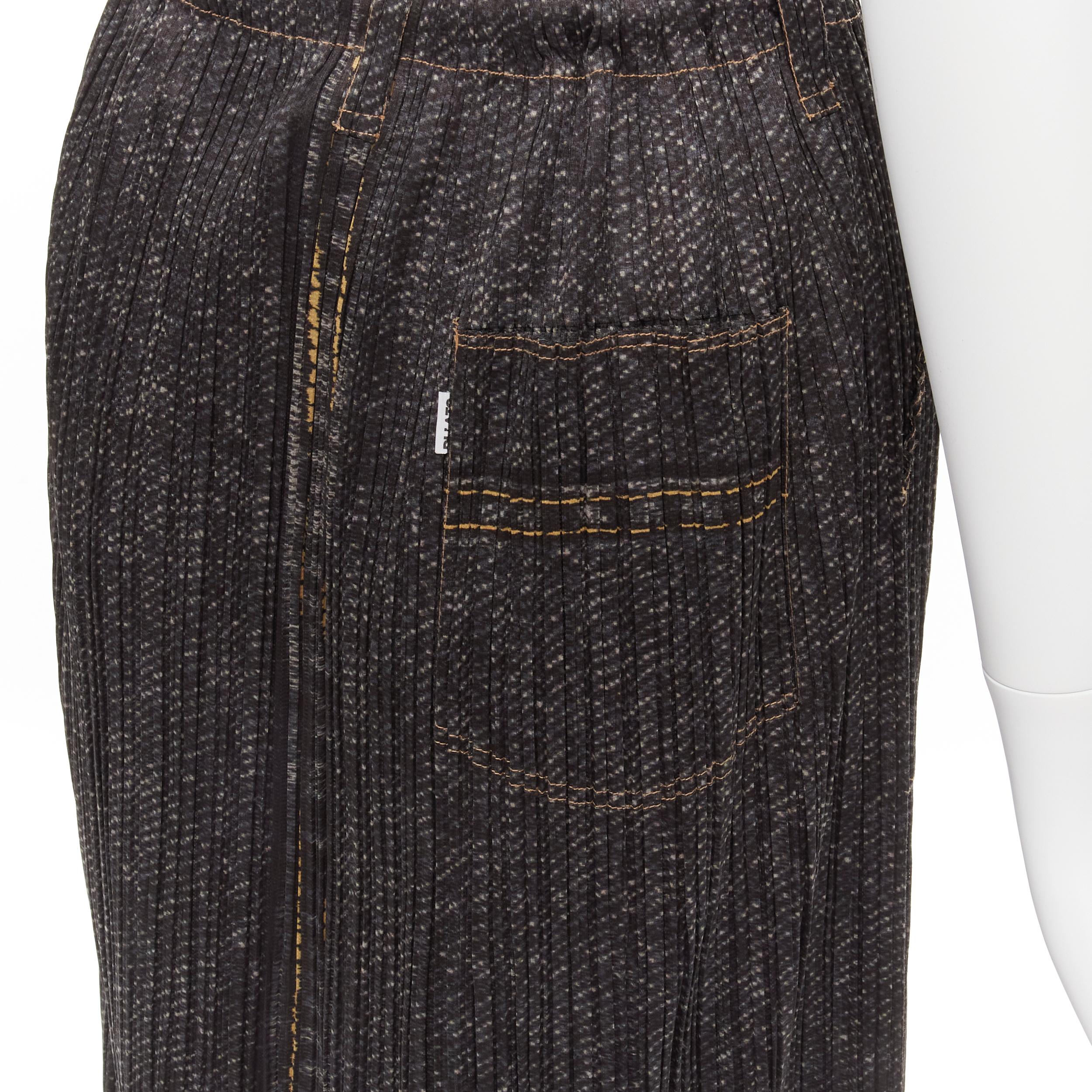 ISSEY MIYAKE PLEATS PLEASE yellow overstitched blue denim tromp loeil skirt JP2
Reference: TGAS/C01968
Brand: Issey Miyake
Collection: Pleats Please
Material: Polyester
Color: Blue, Yellow
Pattern: Photographic Print
Closure: Elasticated
Made in: