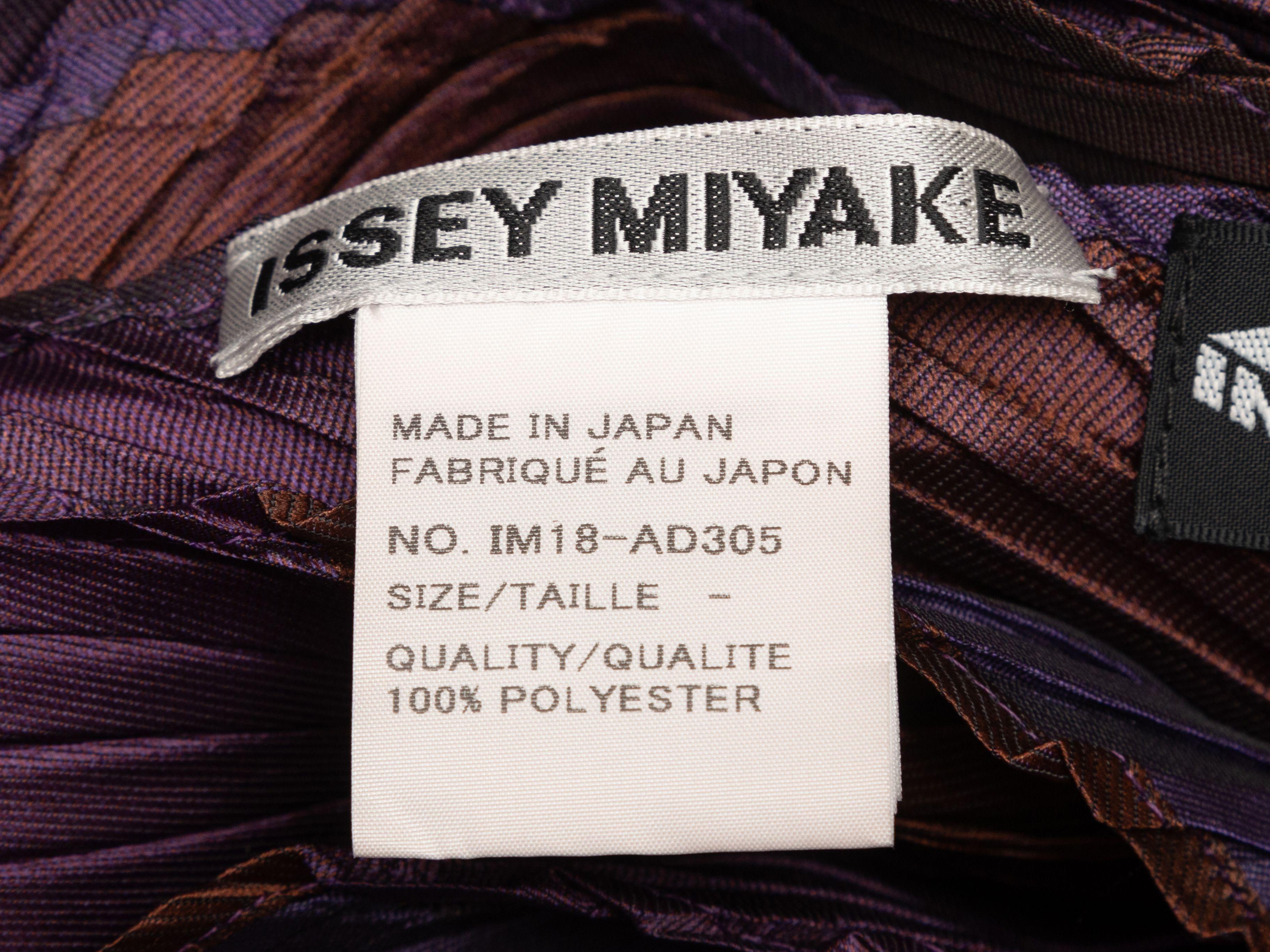Product Details: Purple and brown plisse scarf by Issey Miyake. 59