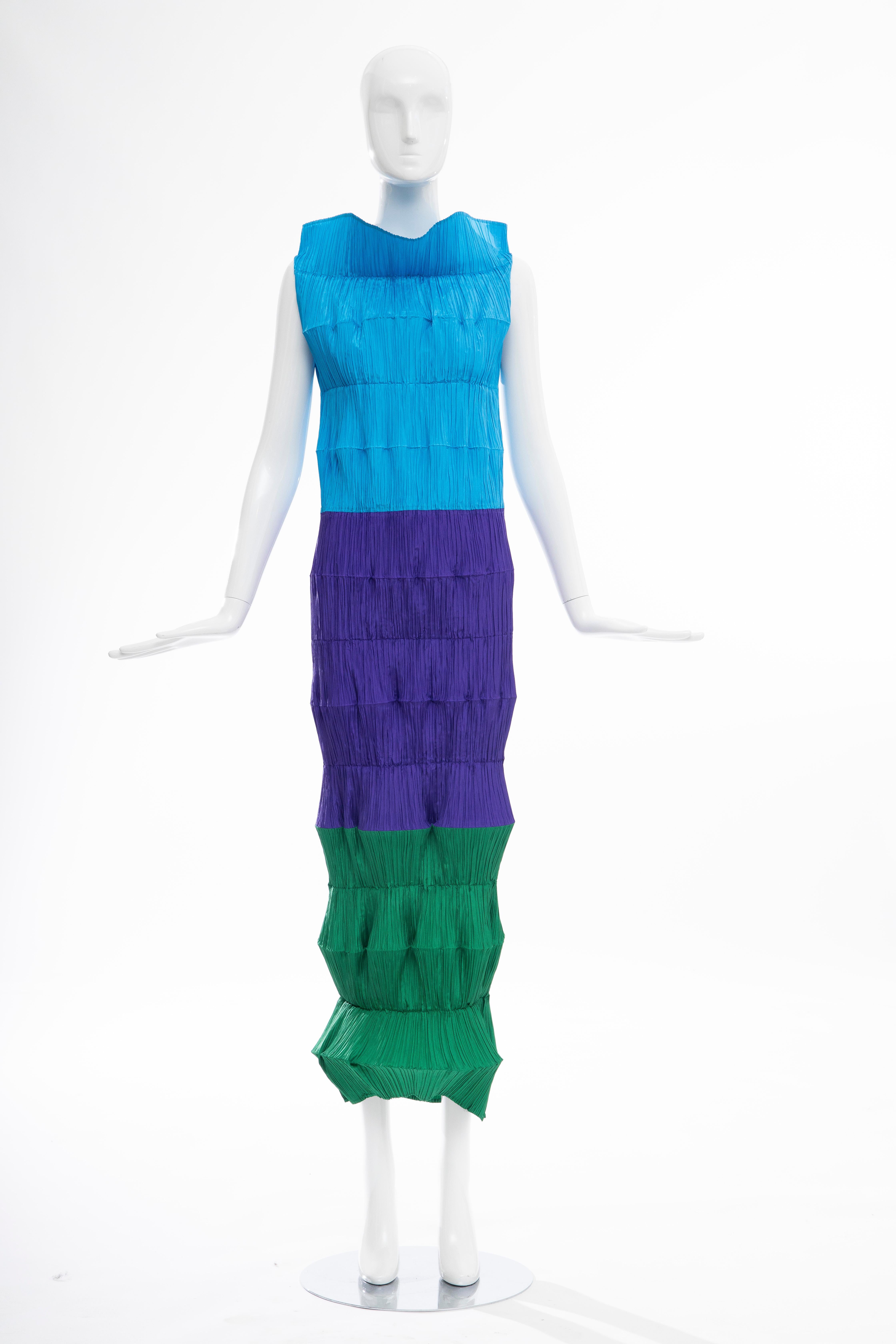  An Issey Miyake 'Flying Saucer' dress, Spring-Summer, 1994, labelled and size M, composed of concertina-pleated discs of brightly coloured polyester, with slits for the arms Similar 'Flying Saucer' dresses were included in the 'Issey Miyake: Making