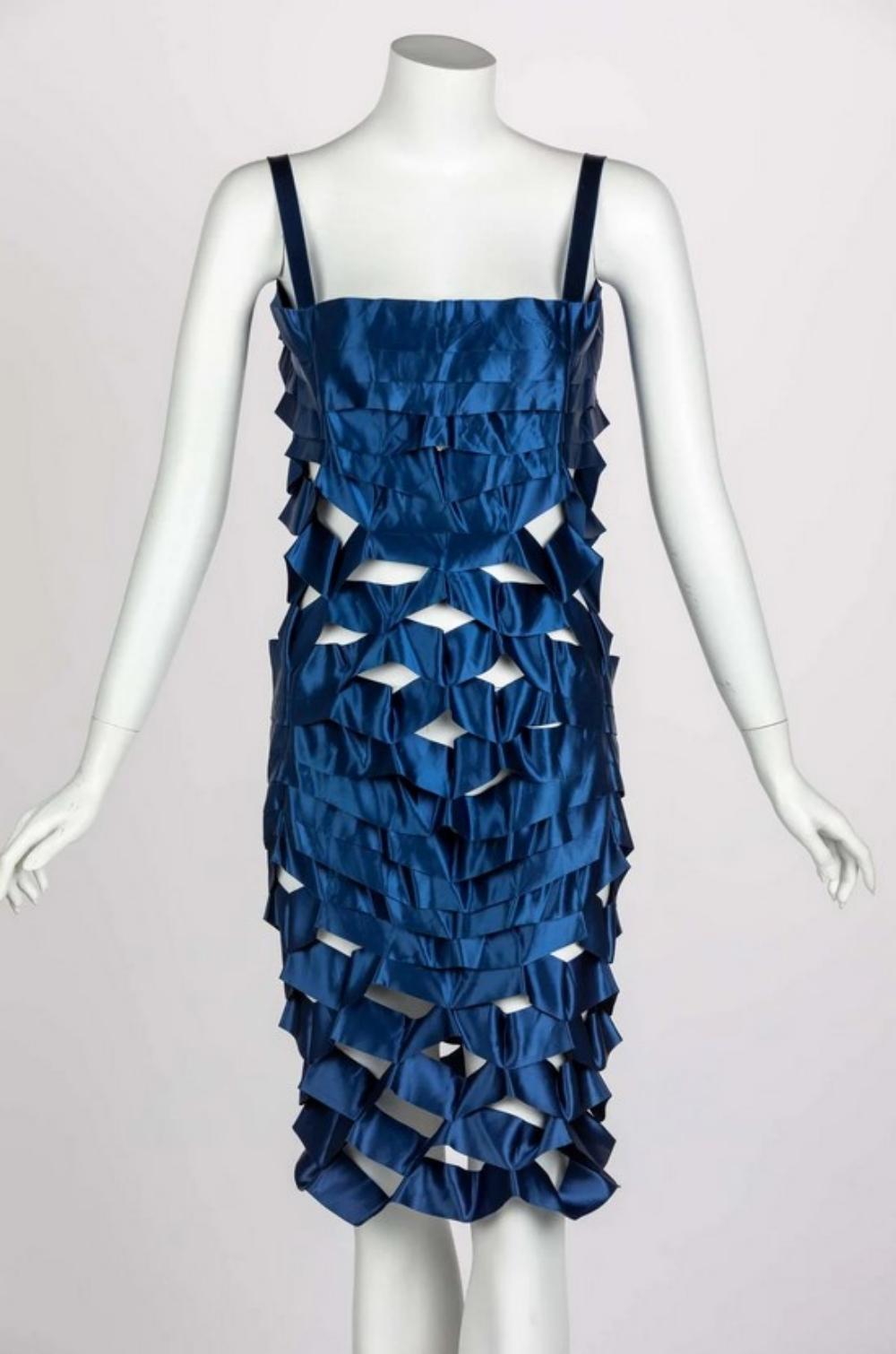 Vintage Issey Miyake Sapphire Japanese Blue Satin Ribbon Cage Dress, 1990s
Drawing inspiration from nature, futuristic Japanese designer Issey Miyake is known for his genius with form and fabric. His interest in perfecting folding techniques comes