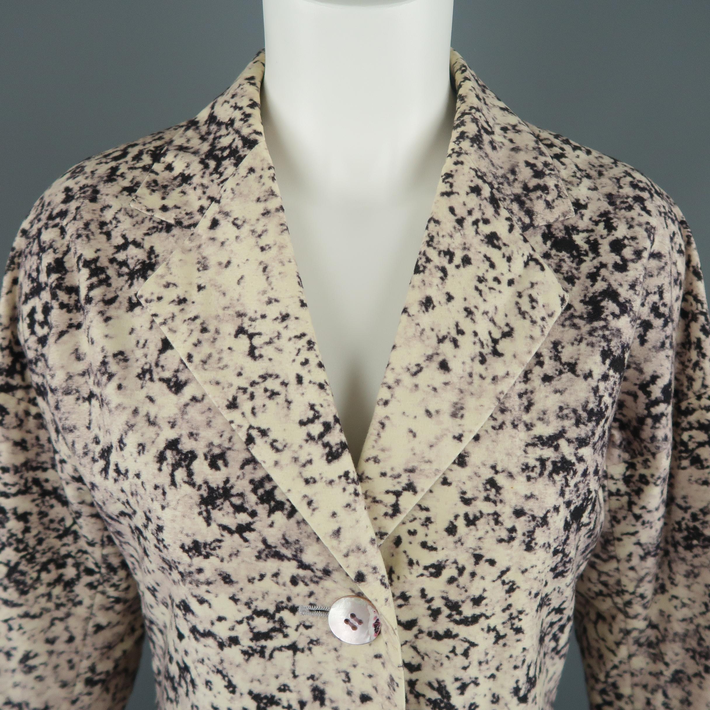 Vintage ISSEY MIYAKE jacket comes in beige purple and black marble print felt with a notch lapel, two button front, slit pockets, drop shoulder, and nylon liner. Made in Italy.
 
Very Good Pre-Owned Condition.
Marked: (no size)
 
Measurements:
