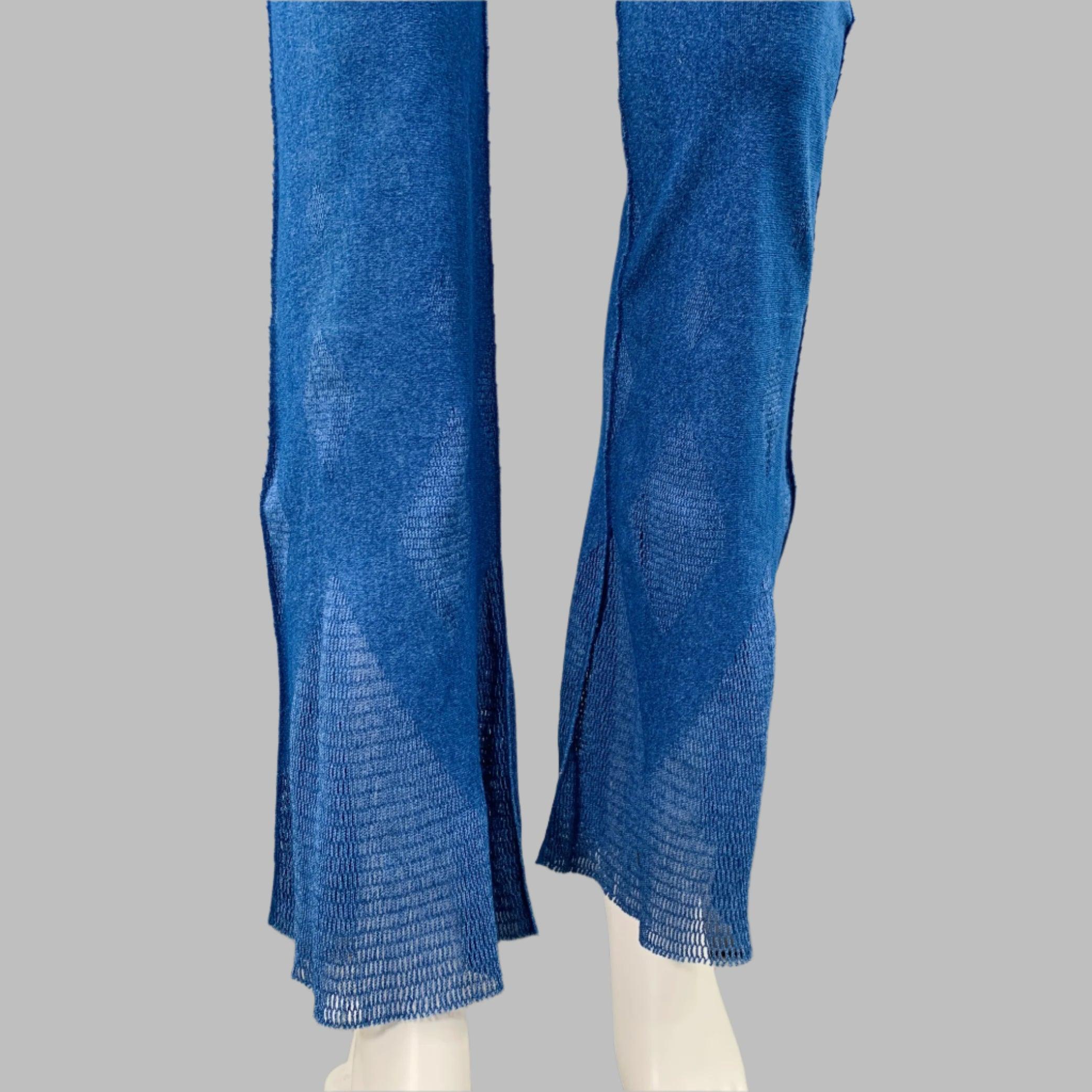 A-POC by ISSEY MIYAKE casual pants
in a blue nylon cotton stretch blend fabric featuring a belted style with attached tie, mesh details, and flared cuff. Made in Japan.Excellent Pre-Owned Condition. 

Marked:   JP 2 

Measurements: 
  Waist: 25 - 30