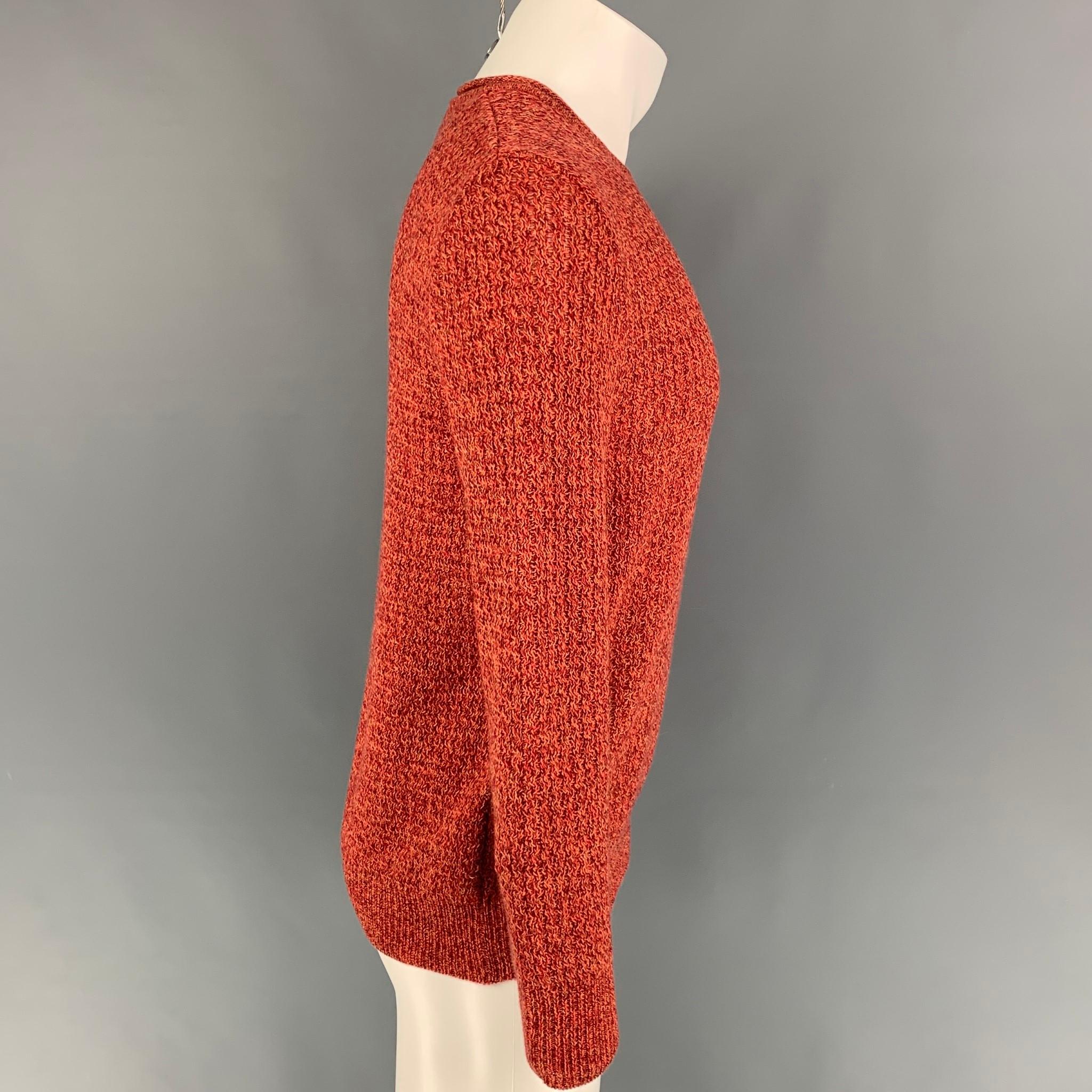 ISSEY MIYAKE pullover comes in a red & orange knitted material featuring a crew-neck. Made in Japan. 

Very Good Pre-Owned Condition.
Marked: JP 2

Measurements:

Shoulder: 18.5 in.
Chest: 42 in.
Sleeve: 25.5 in.
Length: 25.5 in. 