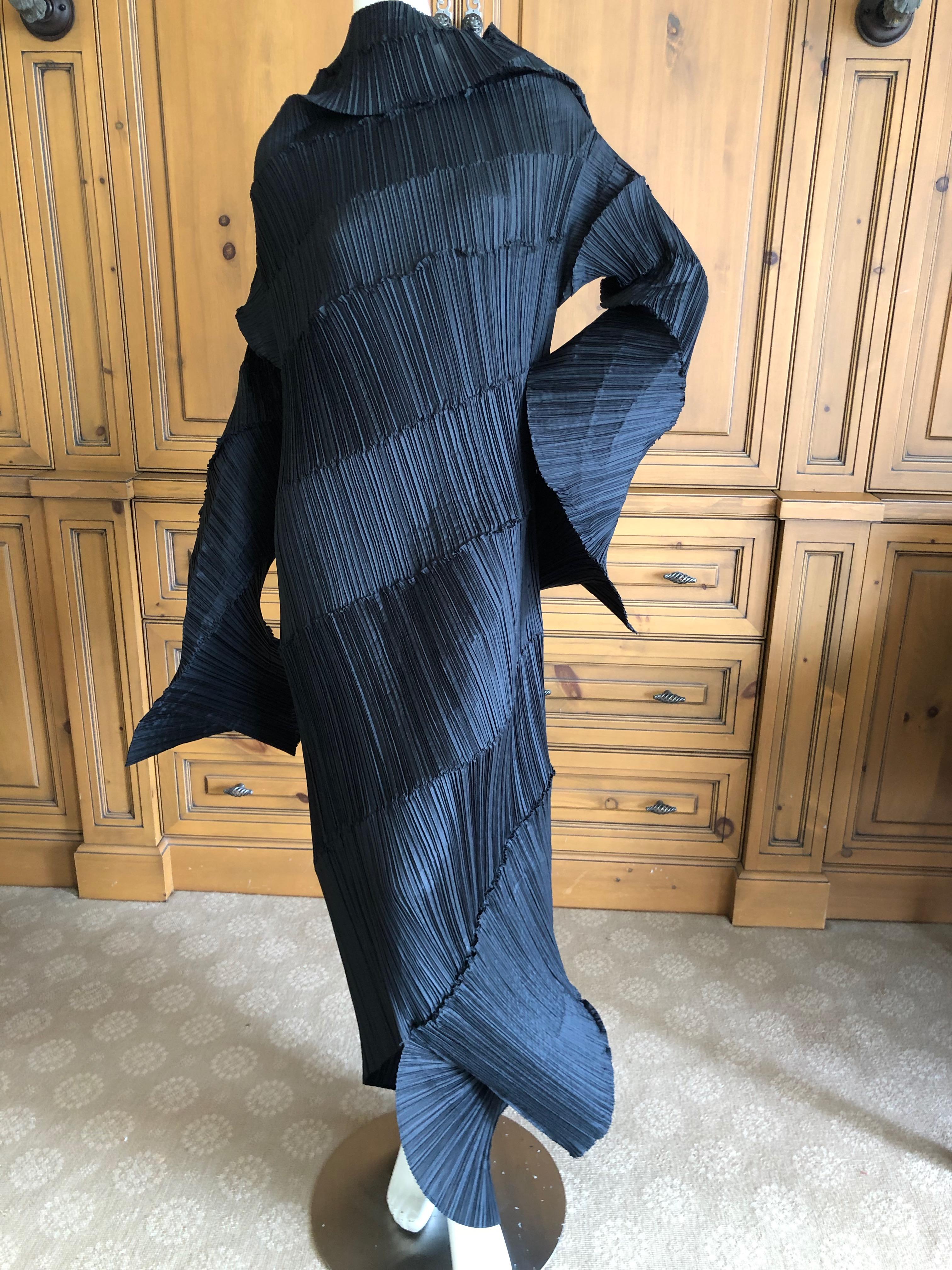 Issey Miyake spiraling pleated oversize black dress.
This is amazing, must be seen to be appreciated. It is very sculptural and extremely overscale
One size fits all the bust measures 44