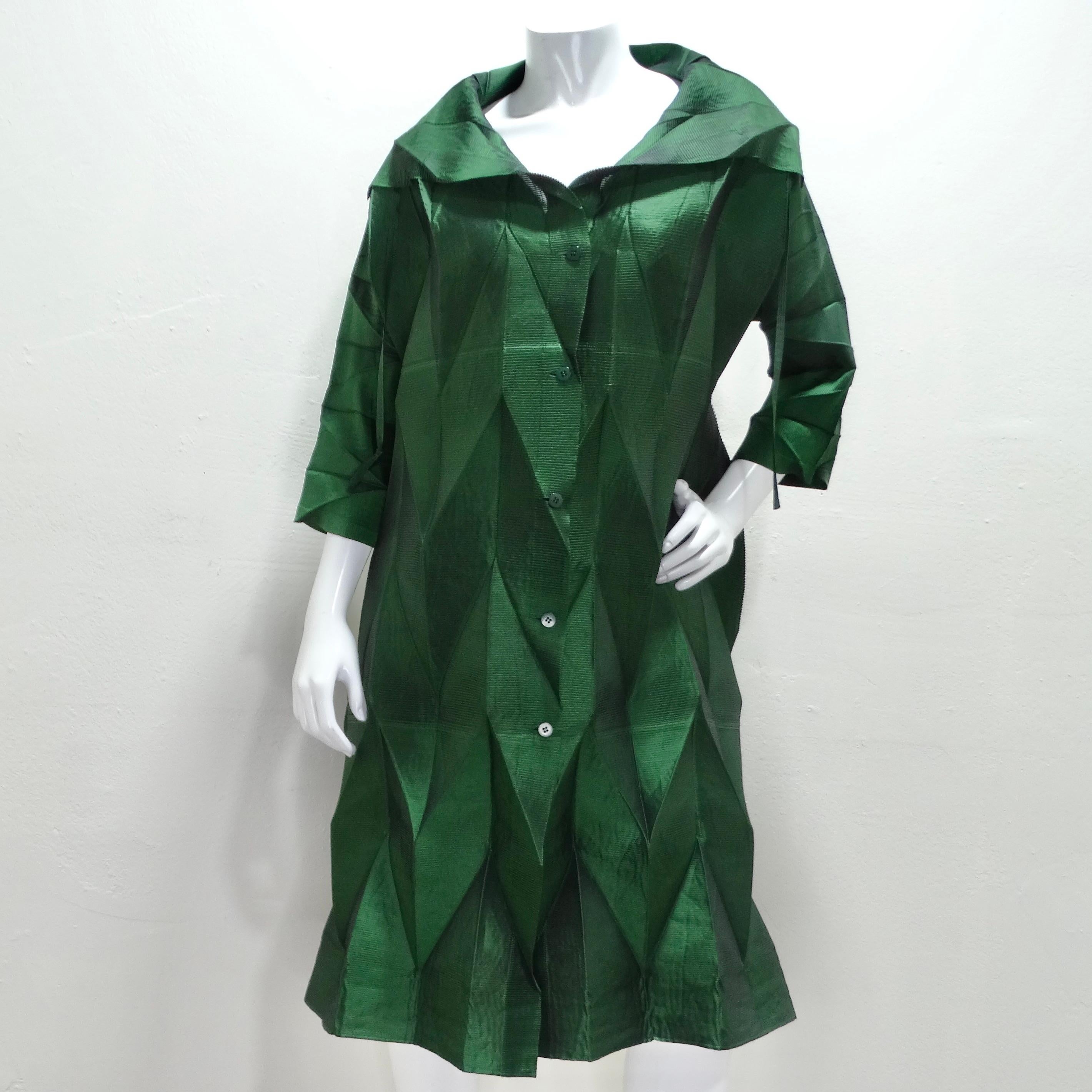 The Issey Miyake Spring 2008 Runway Green Pleated Dress is a striking and innovative piece that embodies the designer's expertise in pleating and textile manipulation. The emerald green color gives this dress a vibrant and luxurious appearance,