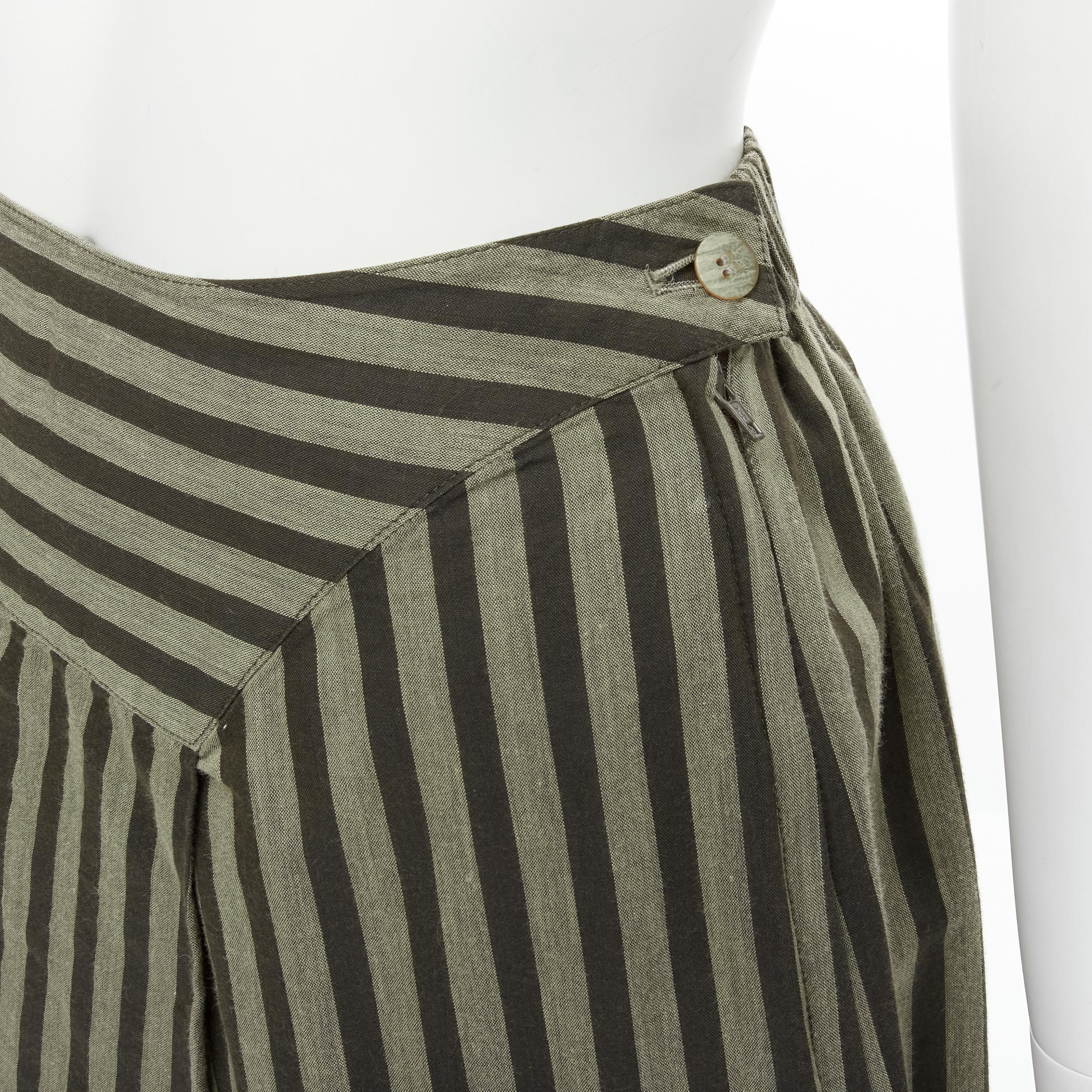 ISSEY MIYAKE Vintage 1980s cotton brown striped diagonal pleat A-line skirt M 
Reference: CRTI/A00565 
Brand: Issey Miyake 
Collection: 1980's 
Material: Cotton 
Color: Brown 
Pattern: Striped 
Closure: Zip Extra Detail: A-line silhouette. Diagonal