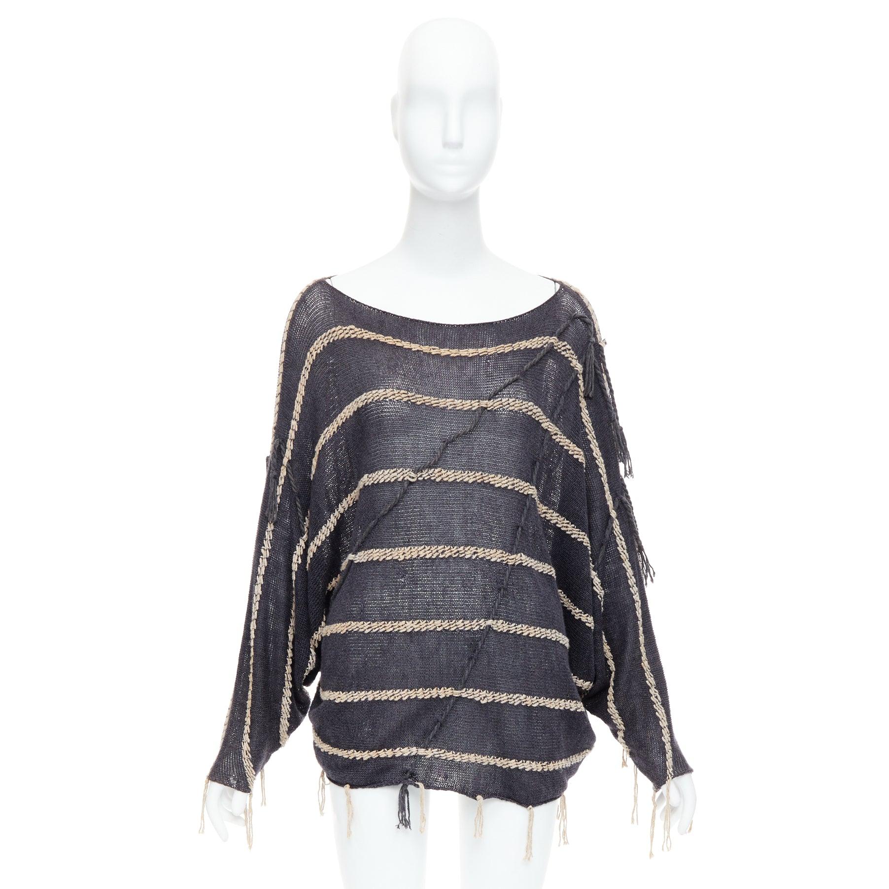 ISSEY MIYAKE Vintage 1980s light grey striped paneled side fringe trim skirt M
Reference: ANSN/A00043
Brand: Issey Miyake
Model: Fringe striped shirt
Collection: 1980
Material: Cotton
Color: Grey
Pattern: Striped
Extra Details: Dark grey sweater