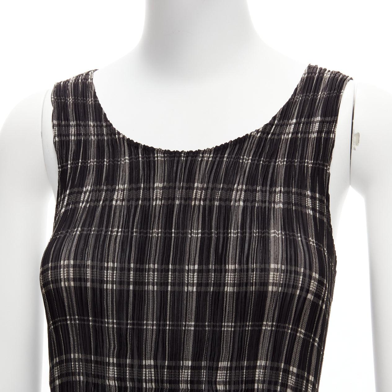 ISSEY MIYAKE Vintage black white plaid check plisse round neck tank top S
Reference: PYCN/A00084
Brand: Issey Miyake
Material: Polyester
Color: Black, White
Pattern: Plaid
Closure: Pullover
Made in: Japan

CONDITION:
Condition: Excellent, this item