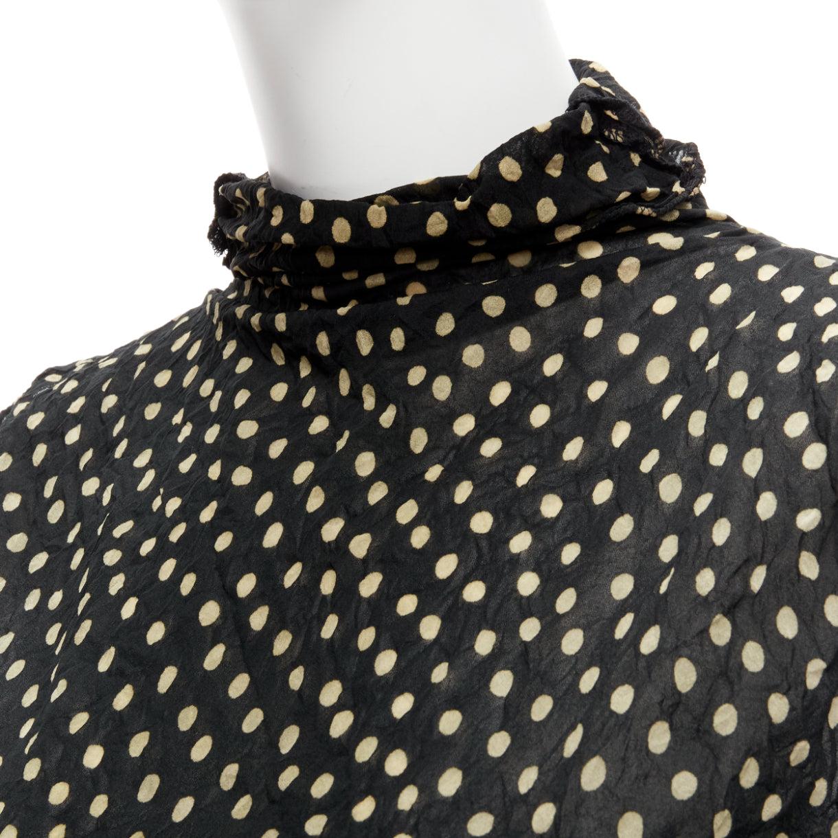 ISSEY MIYAKE Vintage black yellow polka dot crinkle sheer high neck vest top S
Reference: PYCN/A00089
Brand: Issey Miyake
Material: Polyester
Color: Black, Yellow
Pattern: Polka Dot
Closure: Pullover
Made in: Japan

CONDITION:
Condition: Excellent,
