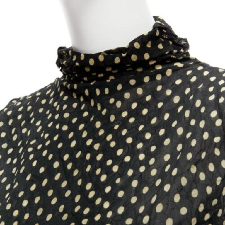 ISSEY MIYAKE Vintage negro amarillo lunares arrugados cuello alto chaleco S
Referencia: PYCN/A00089
Marca: Issey Miyake
Material: Poliéster
Color: Negro, Amarillo
Patrón: Lunares
Cierre: Pullover
Fabricado en: Japón

CONDICIÓN:
Estado: Excelente,