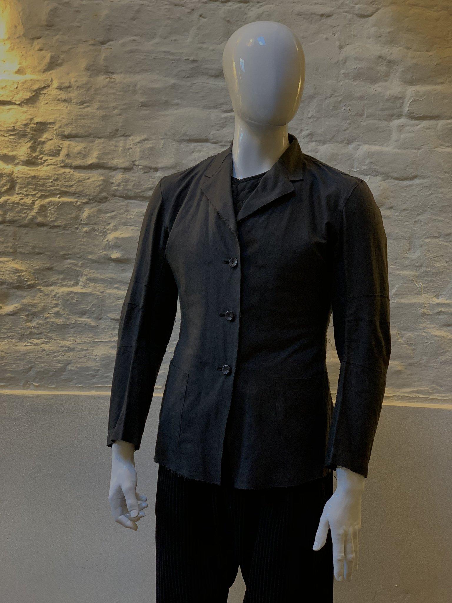 Issey Miyake Vintage Deconstructed Single Breasted Jacket made in Japan from cotton. 

Issey Miyake's first collection was launched in New York in 1971, and began to be shown in Paris Fashion Week from Autumn Winter 1973.

From the very beginning to