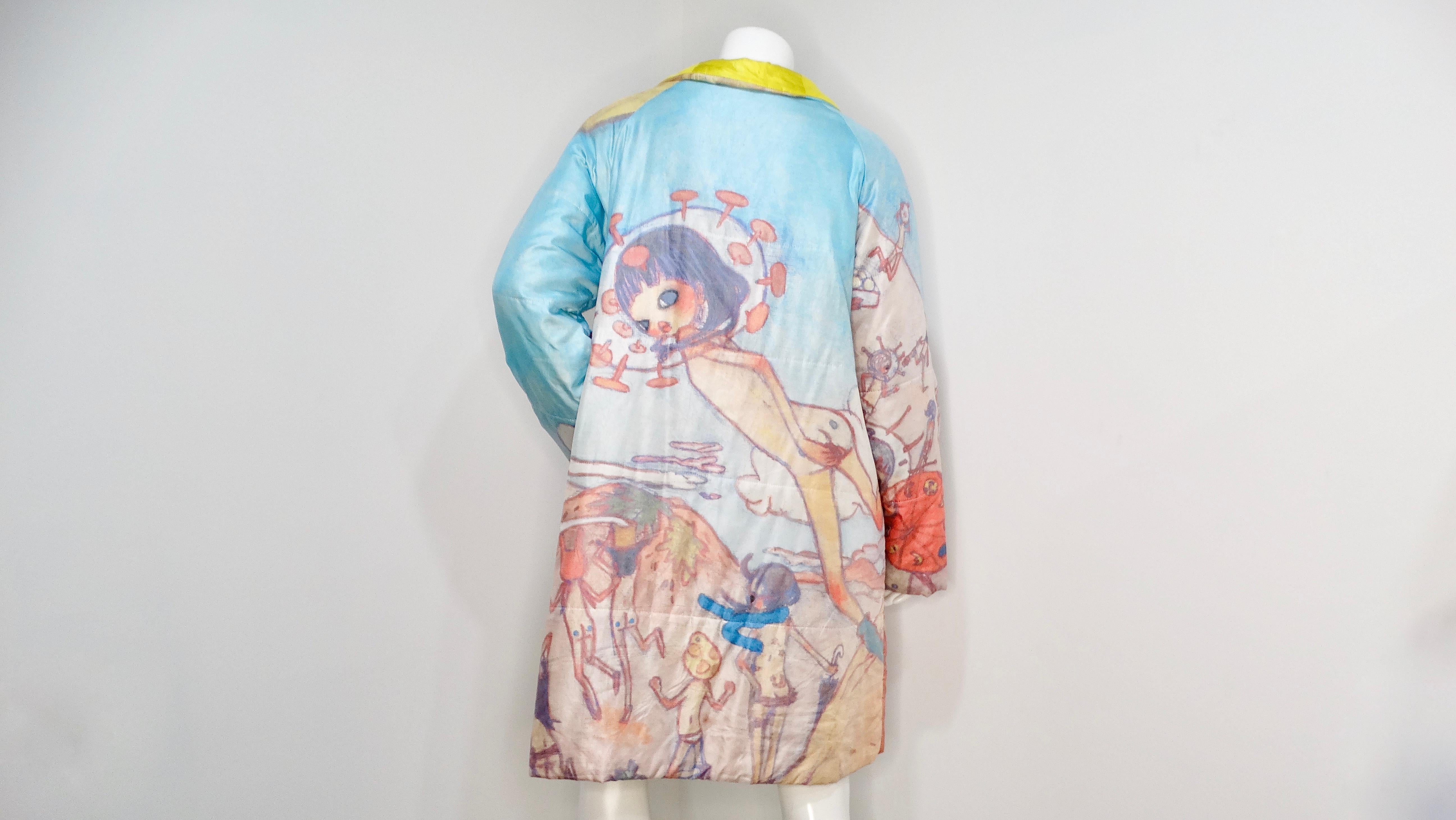 The Issey Miyake x Aya Takano 2004 Runway Fantasy Print Puffer Coat is an extraordinary blend of high fashion and whimsical artistry, epitomizing the spirit of contemporary design. This rare vintage piece showcases an enchanting palette of blues,