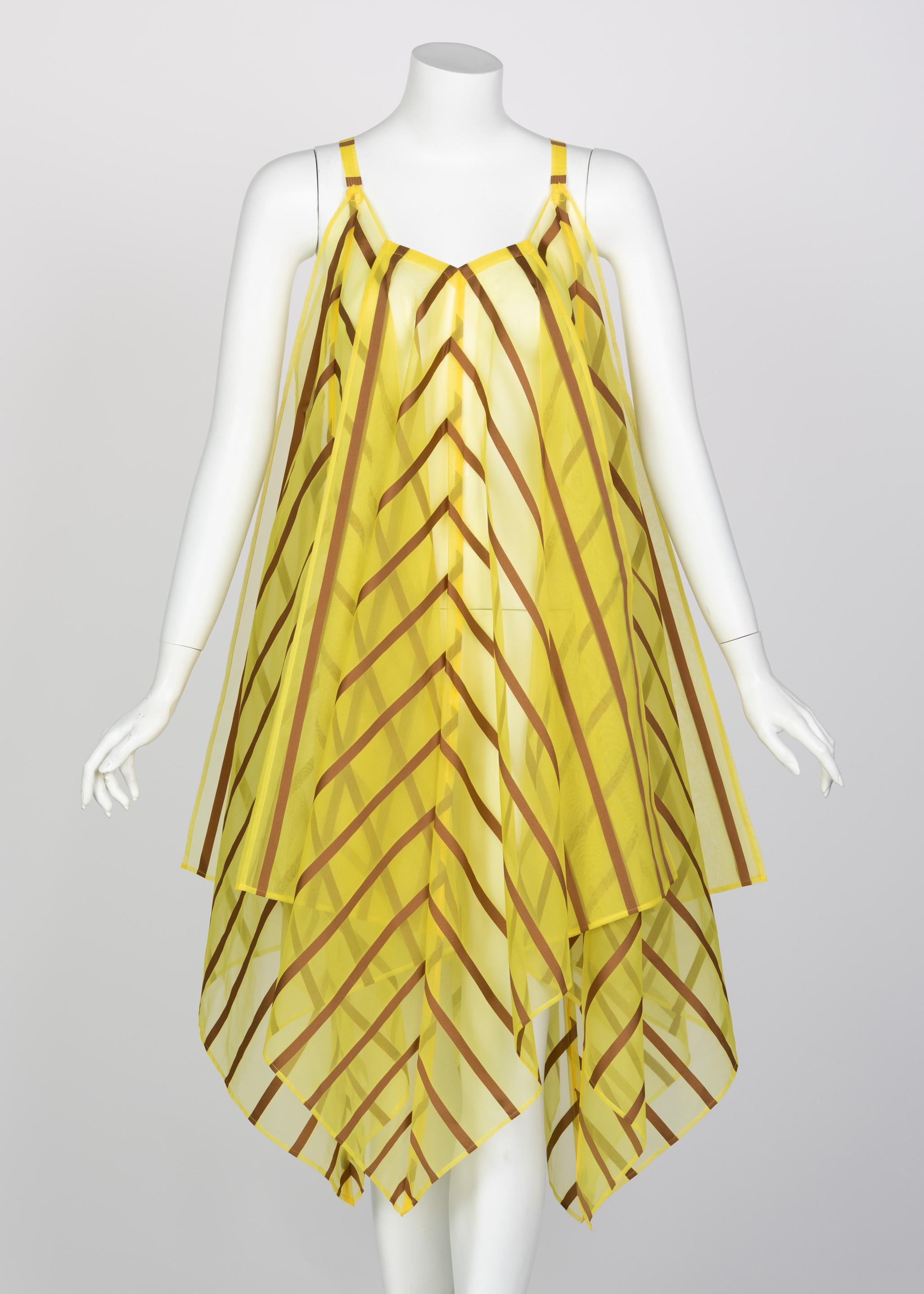 Balance. Simple features. Precision. As much as Issey Miyake is known for his architectural wonders of fashion, his designs also speak volumes through calculated simplicity. This dress is done in a vibrant, sheer yellow organza with copper stripes