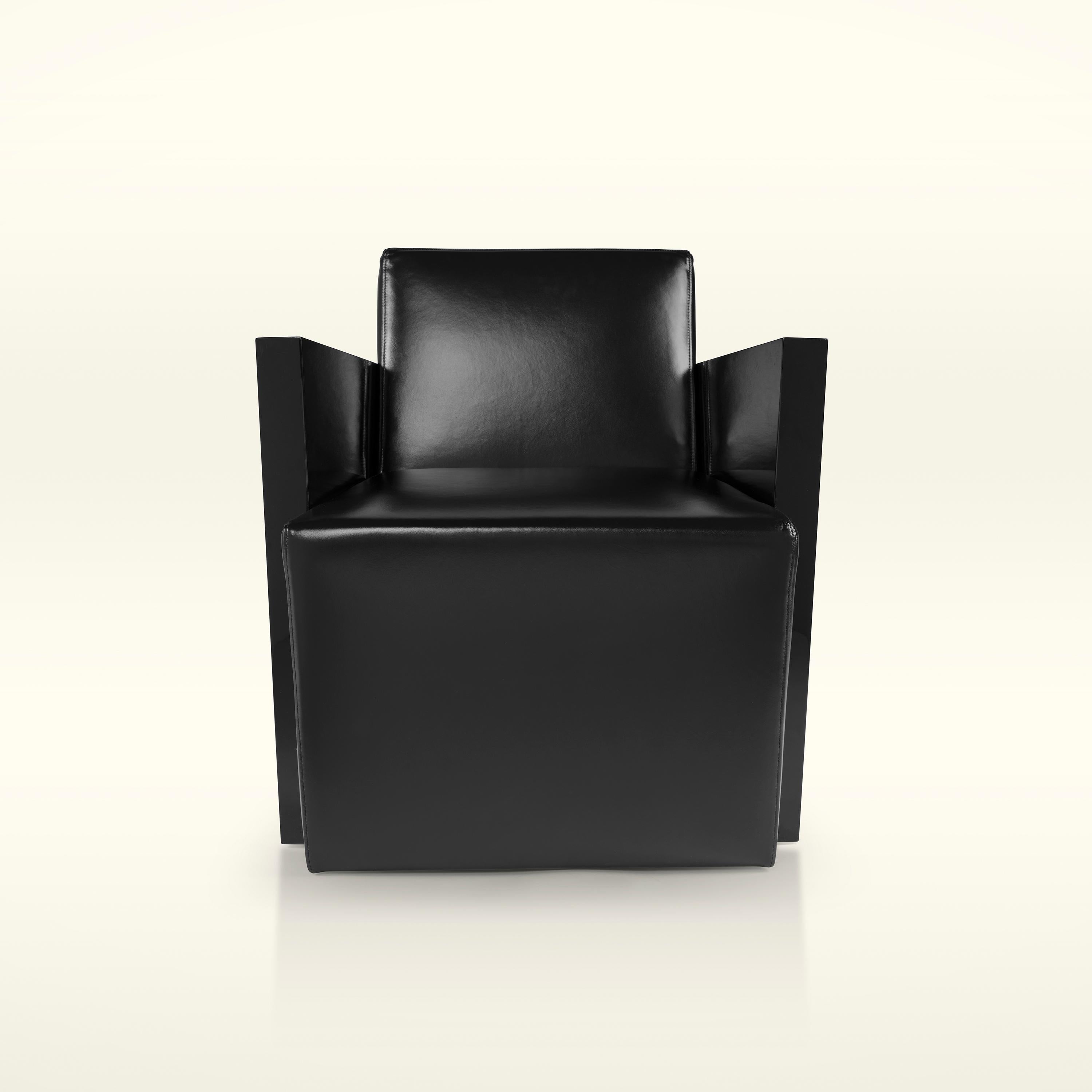 Istanbul Armchair is an elegant piece with the finest leather upholstery for seating, available in black and white, and a piano black lacquer frame. 

