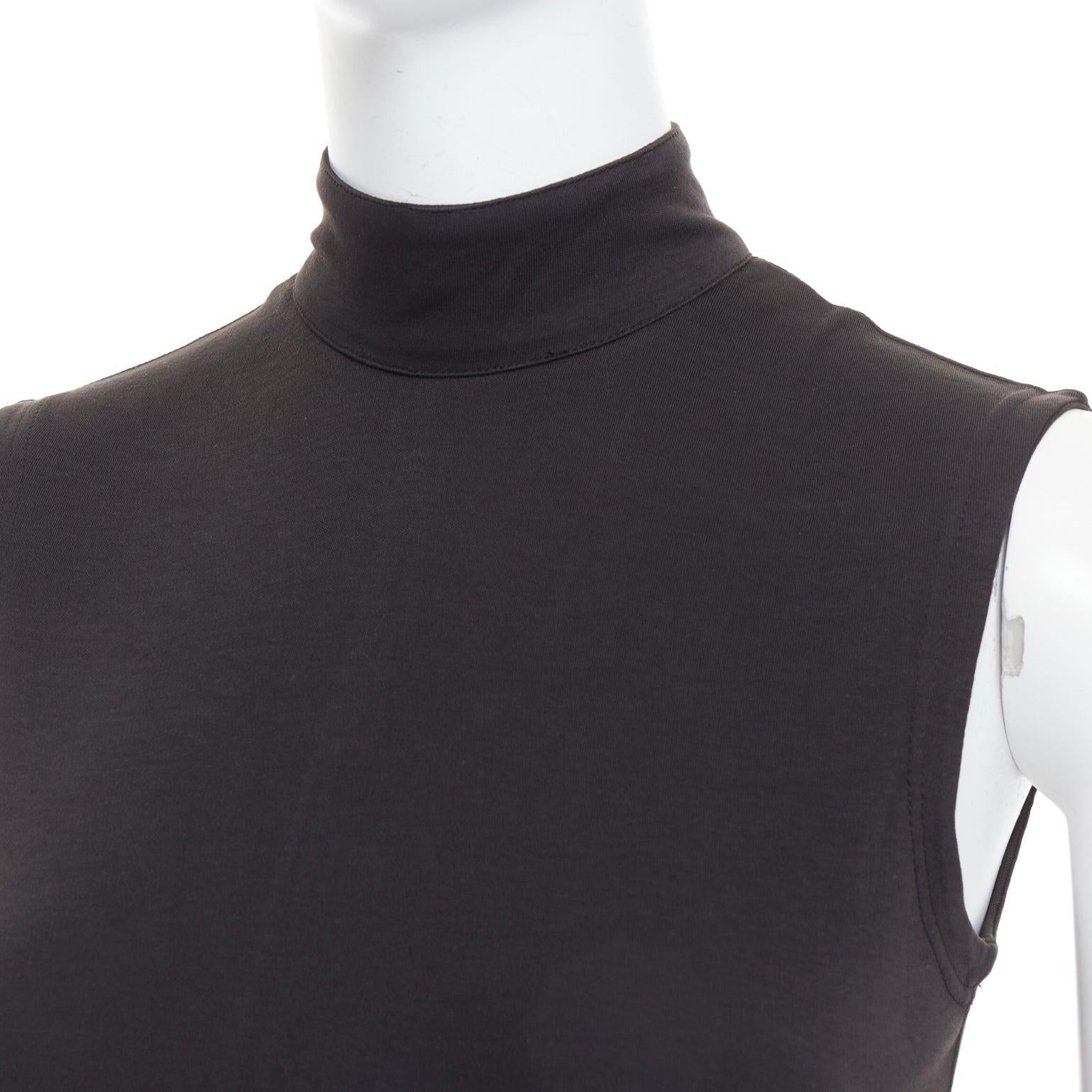 ISTANTE 1995 Gianni Versace black cotton hi neck bodysuit IT38 XS
Reference: LNKO/A02530
Brand: Istante
Designer: Gianni Versace
Collection: 1995
Material: Cotton
Color: Black
Pattern: Solid
Closure: Zip
Made in: Italy

CONDITION:
Condition: Very