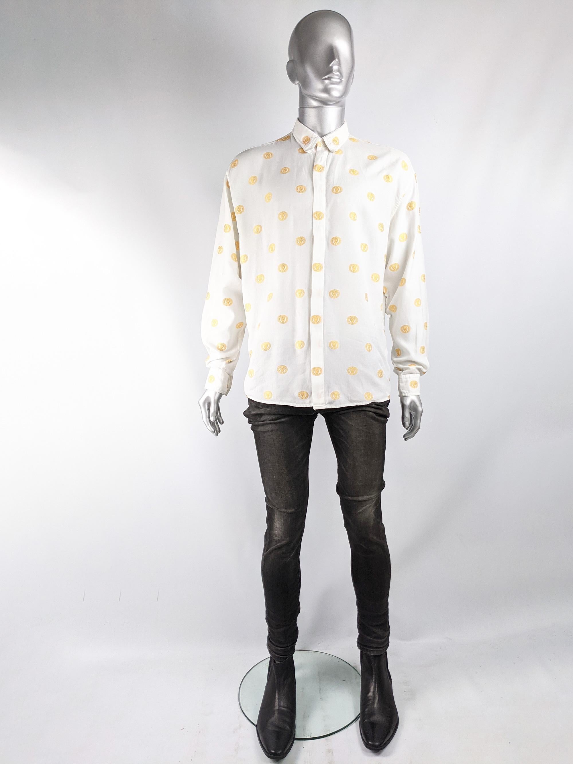 A stylish and rare vintage mens long sleeve button down shirt from the 90s by Gianni Versace for the Istante line (Versaces secondary line, which he designed himself, more expensive at the time than Donatella's Versus line). In a white cotton blend