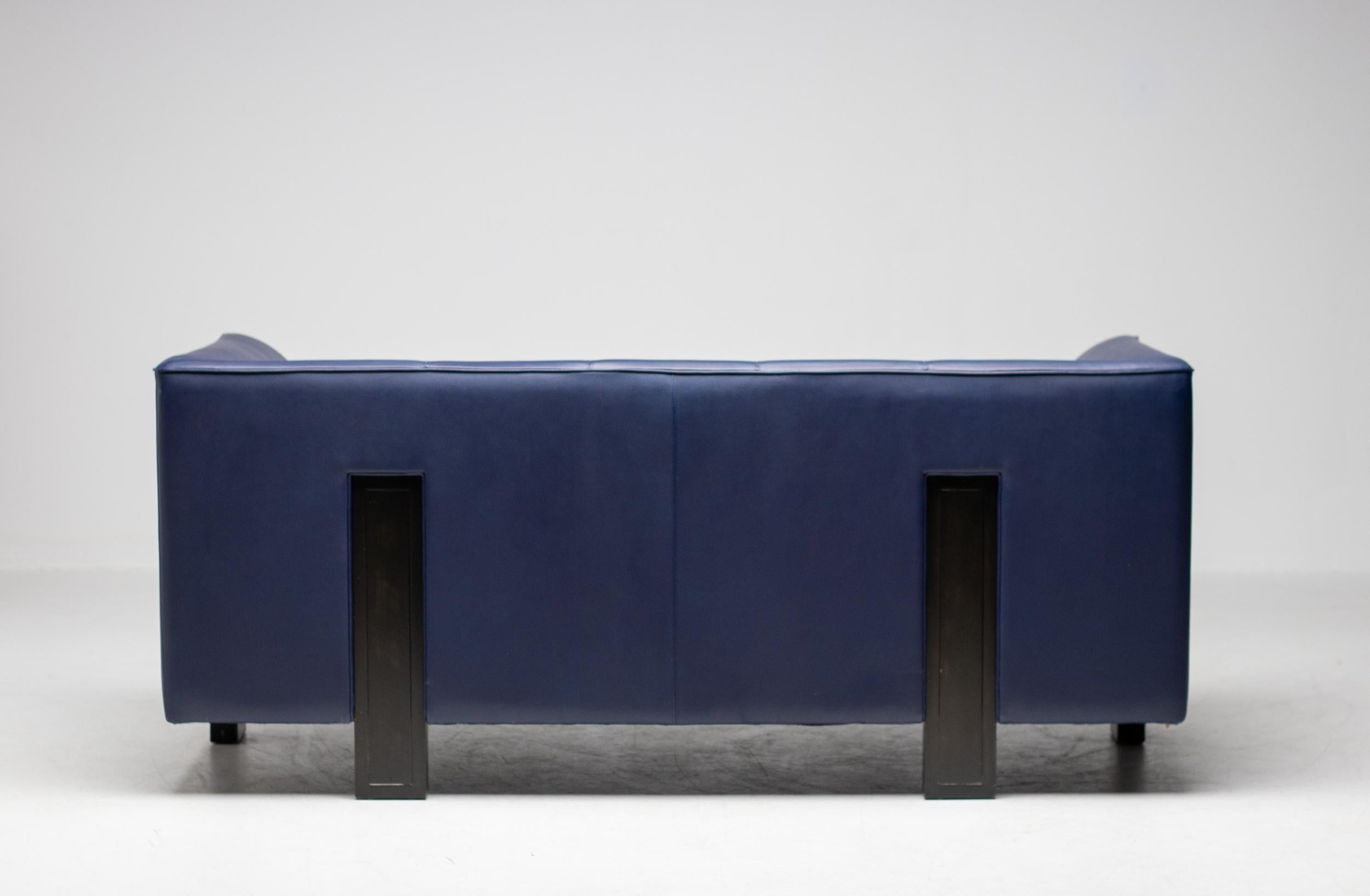 Architectural sofa designed by renown Japanese architect Shigeru Uchida.
This spectacular minimalist but very comfortable sofa with black anodized cast aluminum legs was in production for only a short while in 1995.
The full grain blue leather is in