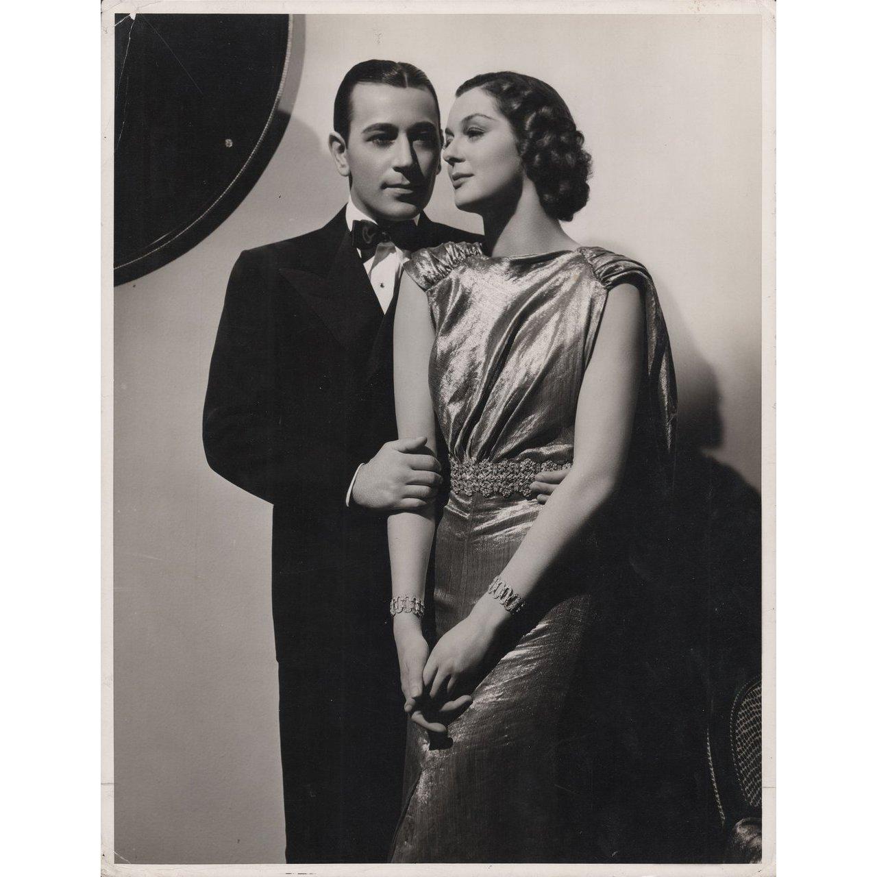 Original 1936 U.S. silver gelatin double-weight photo for the film It Had to Happen directed by Roy Del Ruth with George Raft / Rosalind Russell / Leo Carrillo. Very Good-Fine condition. Please note: the size is stated in inches and the actual size