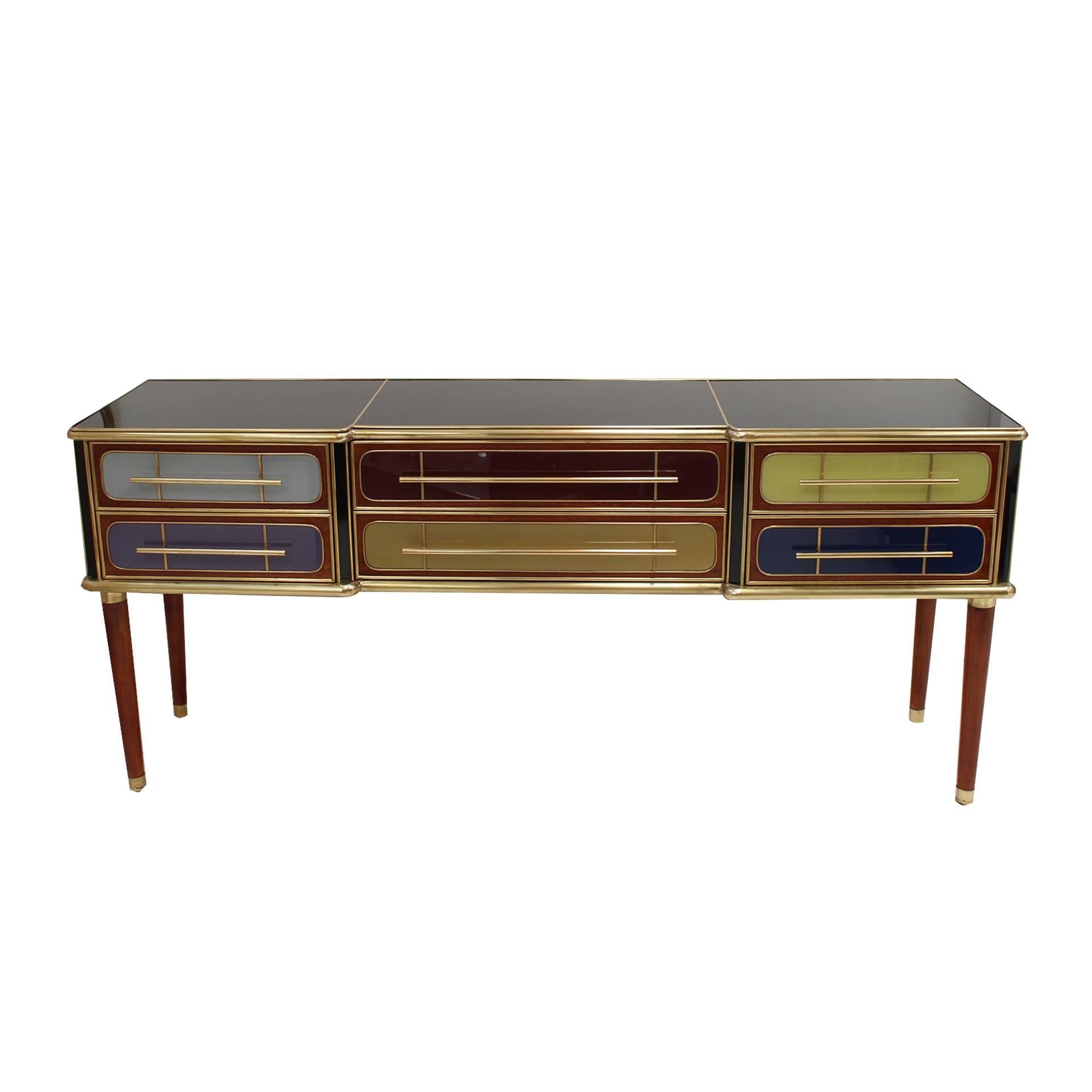 Stunning mid-century Italian sideboard with a striking design from the 1950s. This exquisite piece features a solid wood structure, elegantly covered with colored glass panels that bring a vibrant and sophisticated touch to any interior. With 6