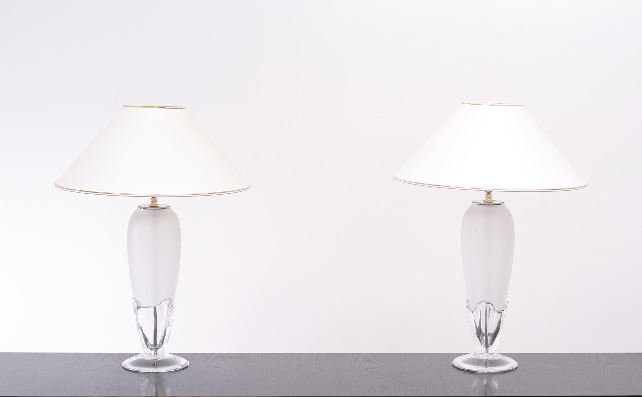 Two very nice vase shaped table lamps Designer Roberta Vitadello Manufactured by Italamp Italy .Clear Chrystal glass base .comes with frosted glass upright. Complete with shades. One E27 bulb each needed. Signed ''Italamps''.
 