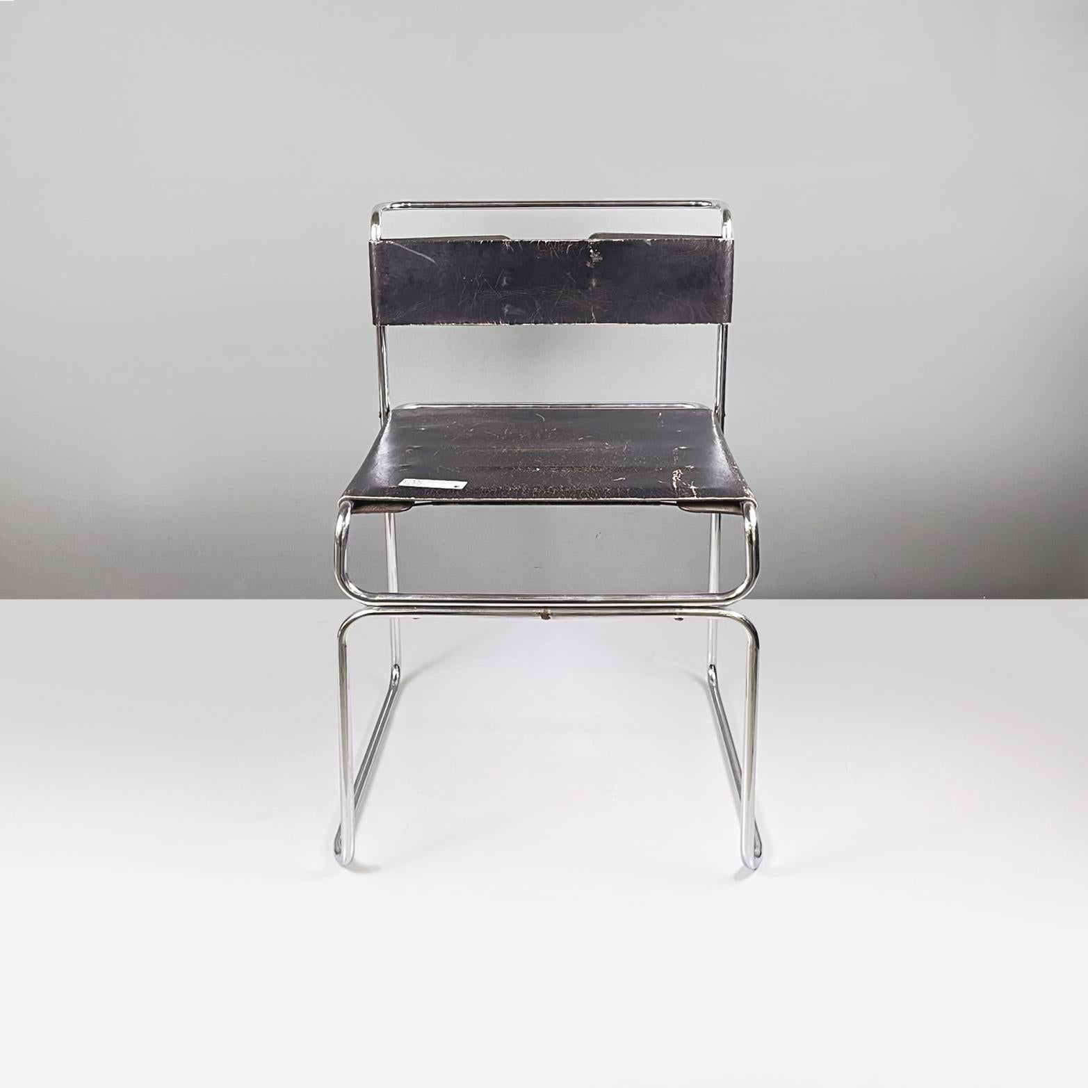 Italia modern Black leather and steel Chair Libellula by Giovanni Carini for Planula, 1970s
Chair mod. Libellula (dragonfly) with seat and back composed of two rectangular strips of black leather. The structure, that keeps the black leather bands