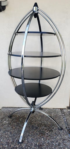 Italian Chrome and Wood Revolving Shelving Units