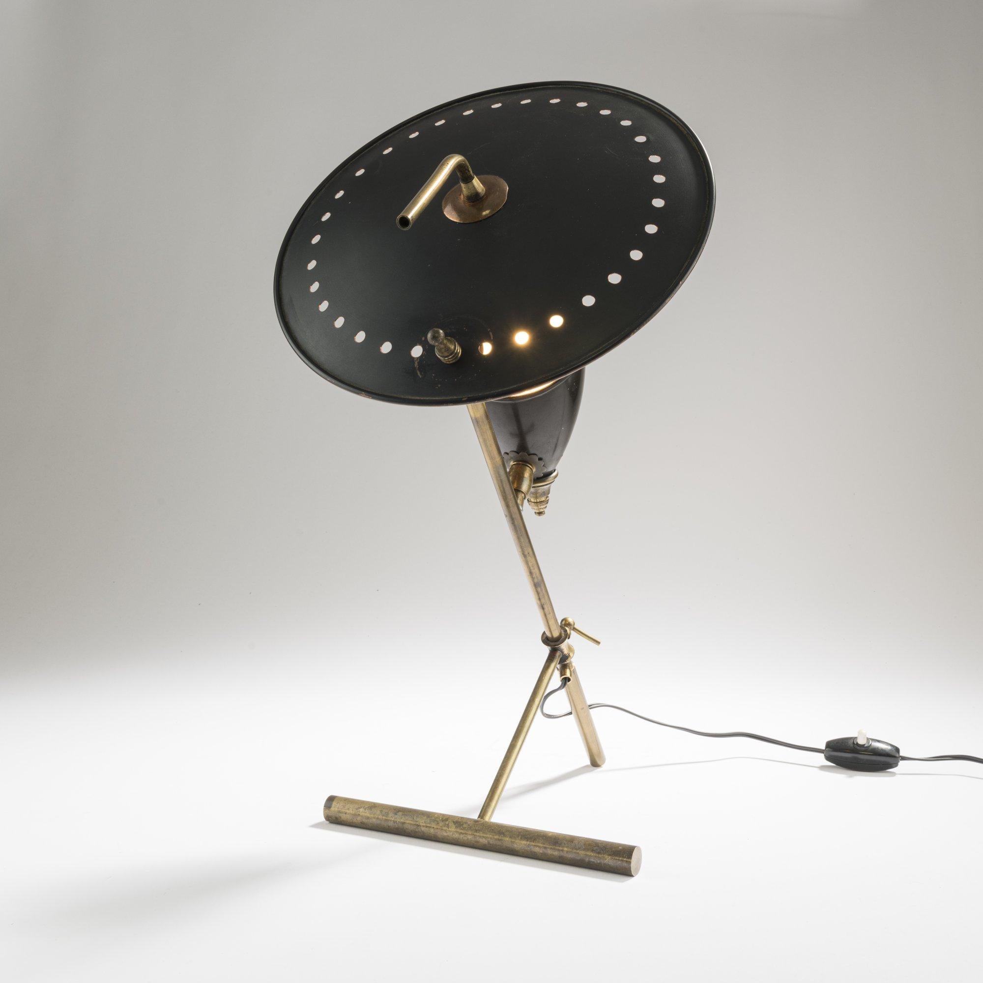 Table lamp, Italy 1950s. Brass, aluminum and sheet copper, perforated, black painted shade.