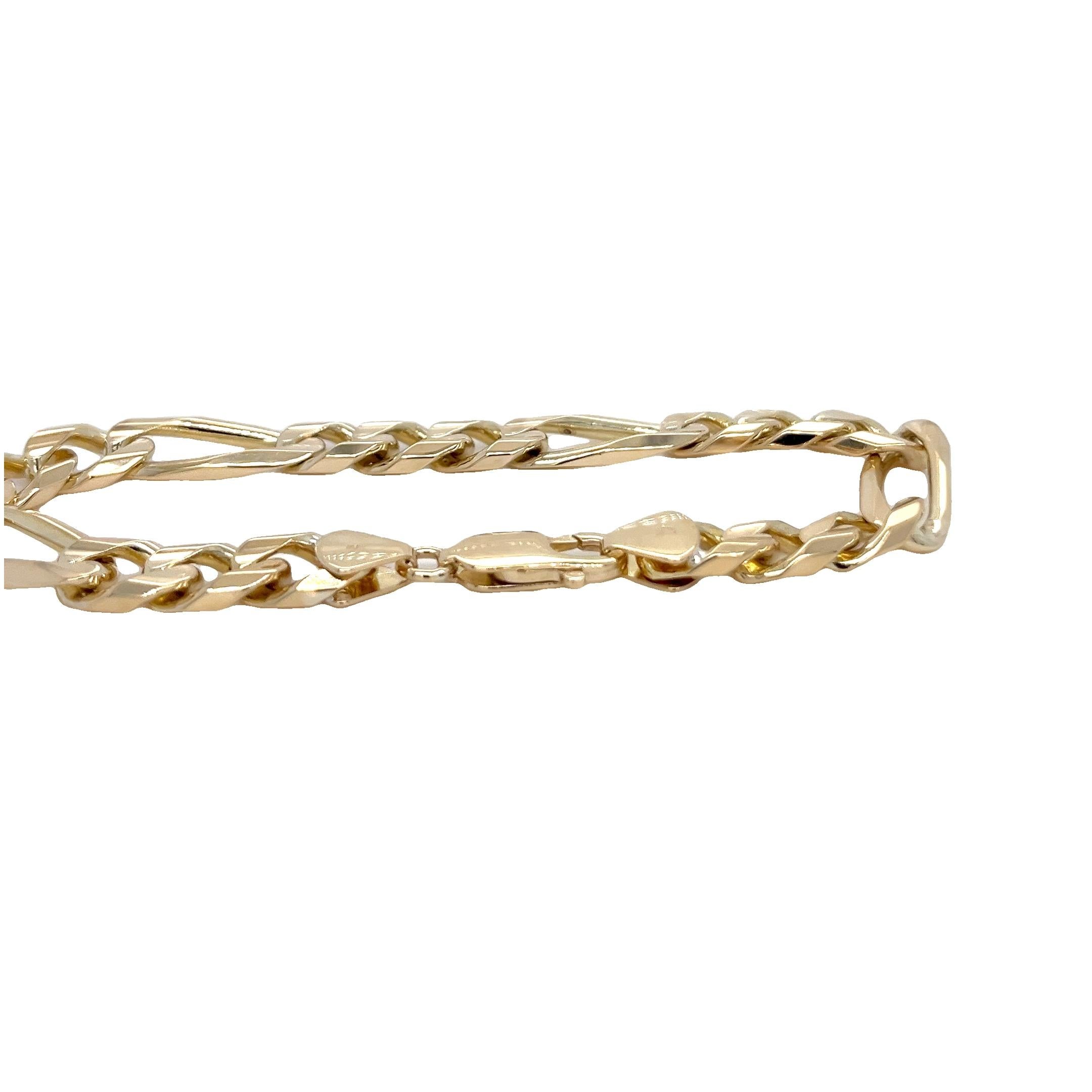 This classic 14 karat yellow gold Figaro bracelet showcases timeless Italian craftsmanship with its distinctive 8.1mm link design. Measuring 8 inches in length, the bracelet is secured with a durable lobster clasp, ensuring both comfort and security