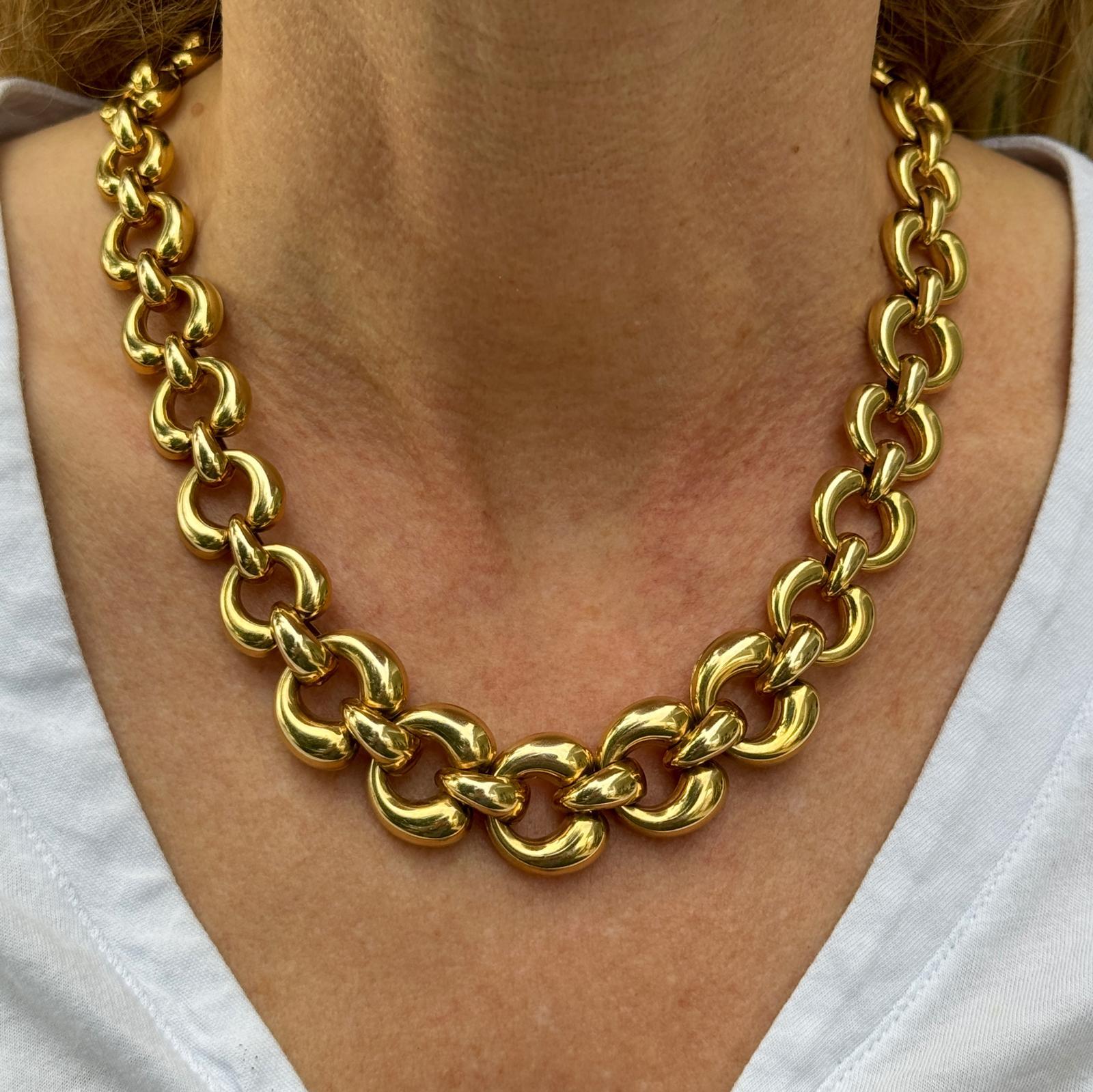 Modern Italian graduated link necklace crafted in 14 karat yellow gold. The necklace measures 17.75 inches in length and .50- .75 inches in width. Weight: 57.1 grams.