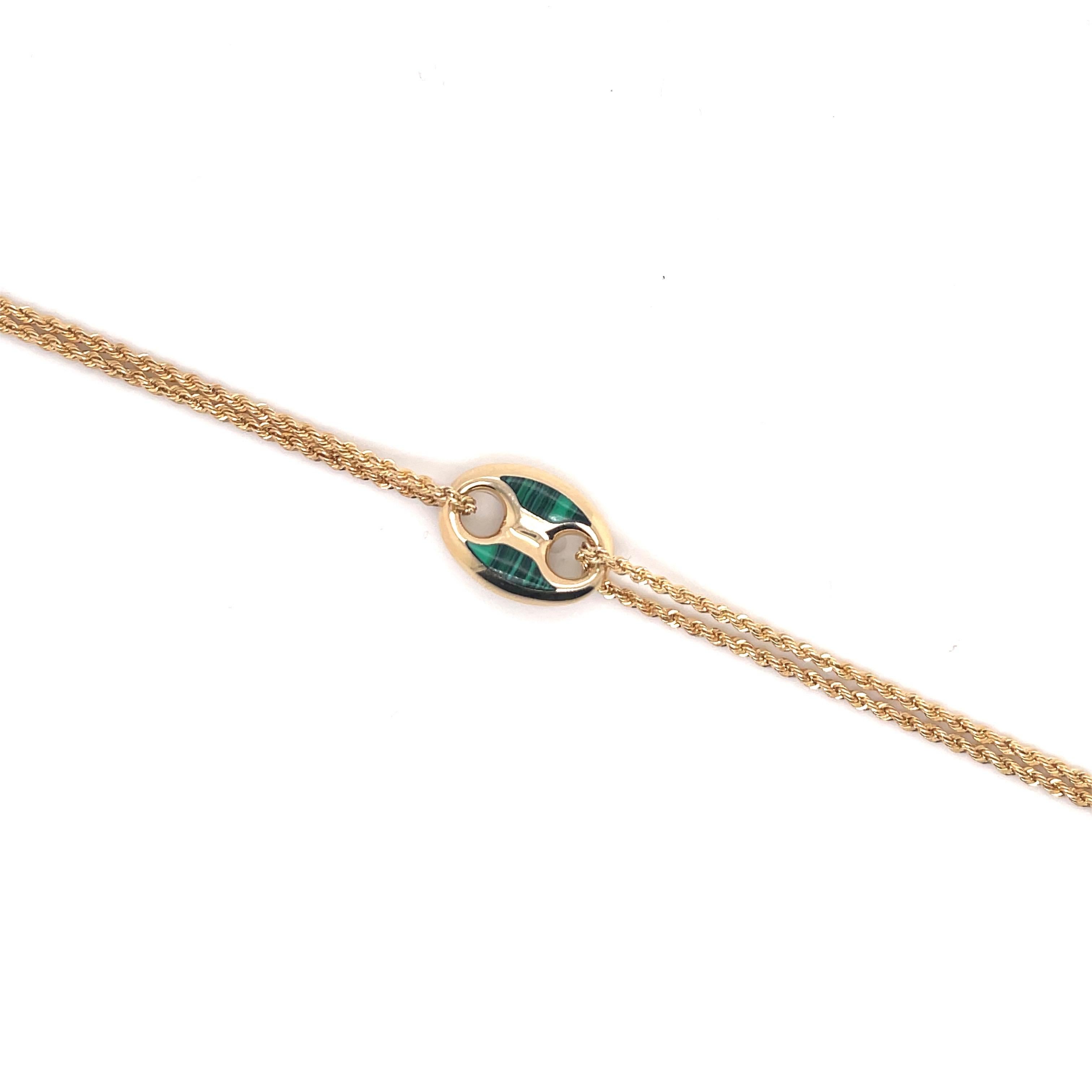 Made in Italy, this 14 karat yellow gold bracelet features one Mariner link with green overlay. 
More colors available.
Great for stacking! 
Email for more pictures & styles. 
