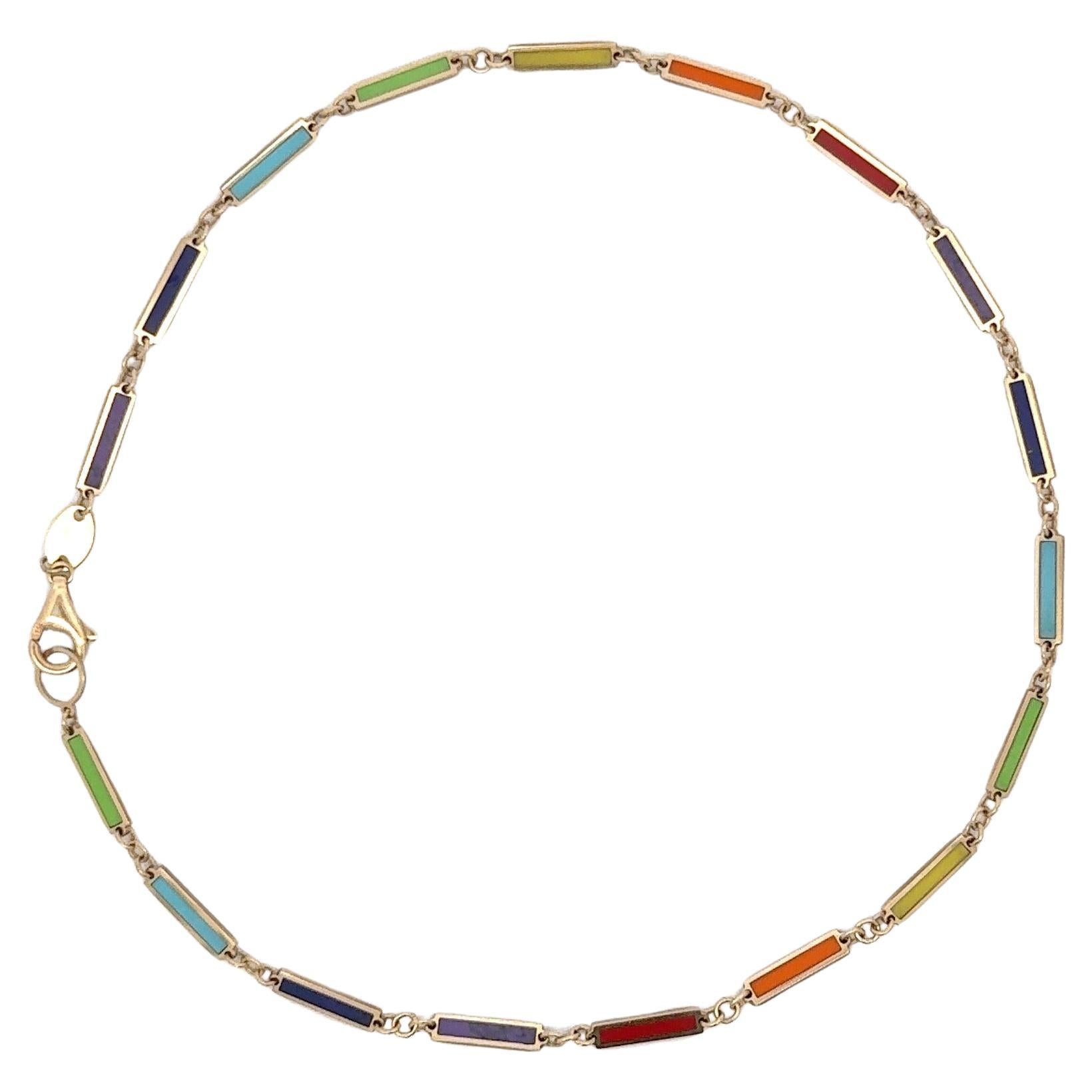 Italian made, this 14 karat yellow gold anklet bracelet features multi-color enamel bars weighing 2.7 grams.
Available in other colors & shapes.