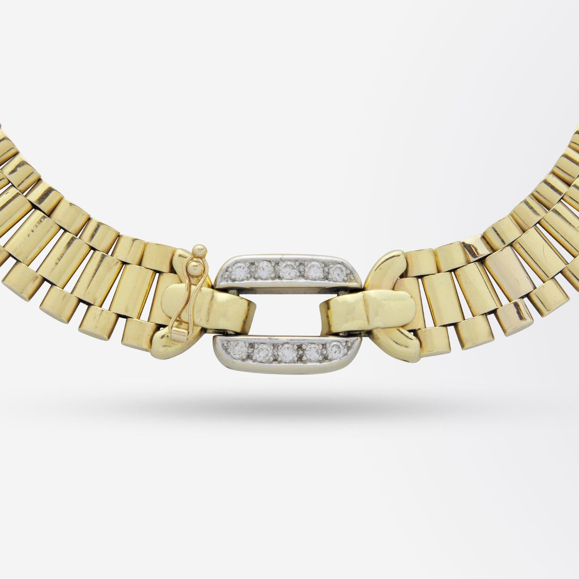 A heavy and beautifully made Italian, 14 karat yellow gold necklace crafted from 'Rolex style' links. To the centre front (or centre back depending on your mood) sits an oval rectangle fold over clasp that is set with brilliant cut diamonds and