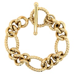Italian 14 Karat Yellow Gold Twisted 
High Polished Figaro Bracelet 21.1 Grams