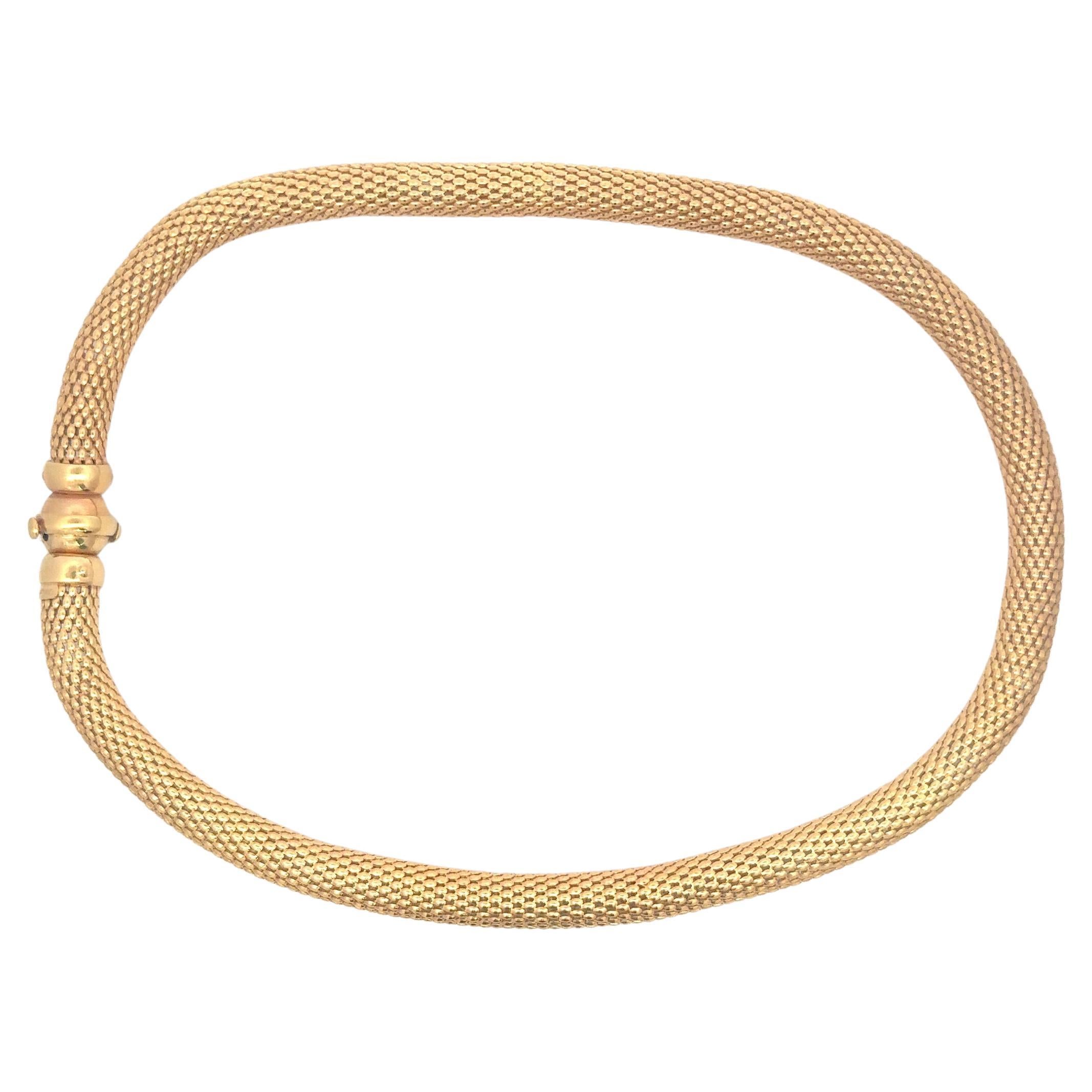 14 Karat yellow gold woven motif tube necklace weighing 34.5 grams, made in Italy. 
8 MM Wide
17 Inches 