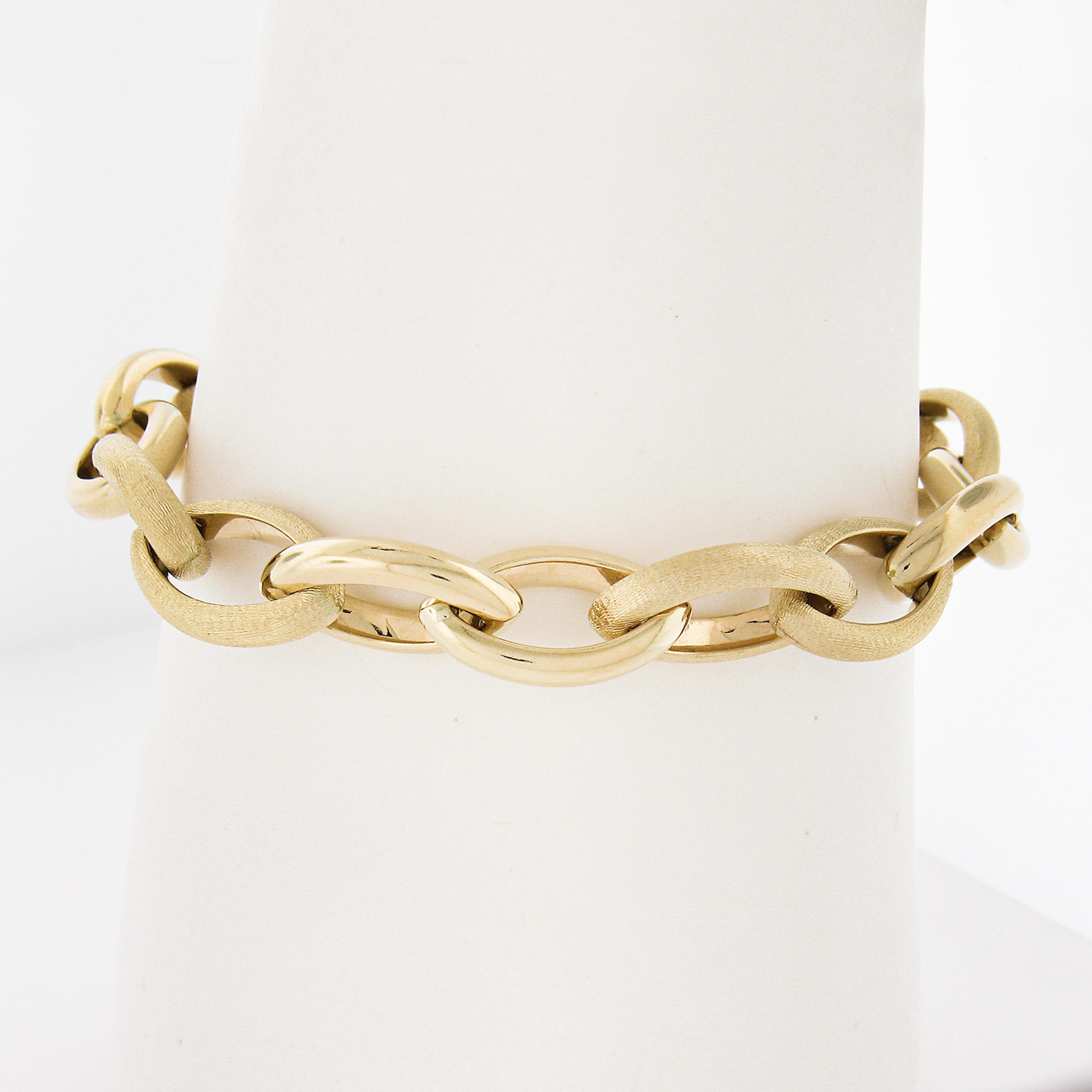 Material: Solid 14k Yellow Gold
Weight: 12.20 Grams
Chain Type: Open Marquise Links
Chain Length: Measures 7 Inches Next to a Ruler. Will Comfortably fit a 6.5 inch wrist (fitted on a wrist)
Clasp: Large Lobster Claw Clasp
Link Width: 10.3mm