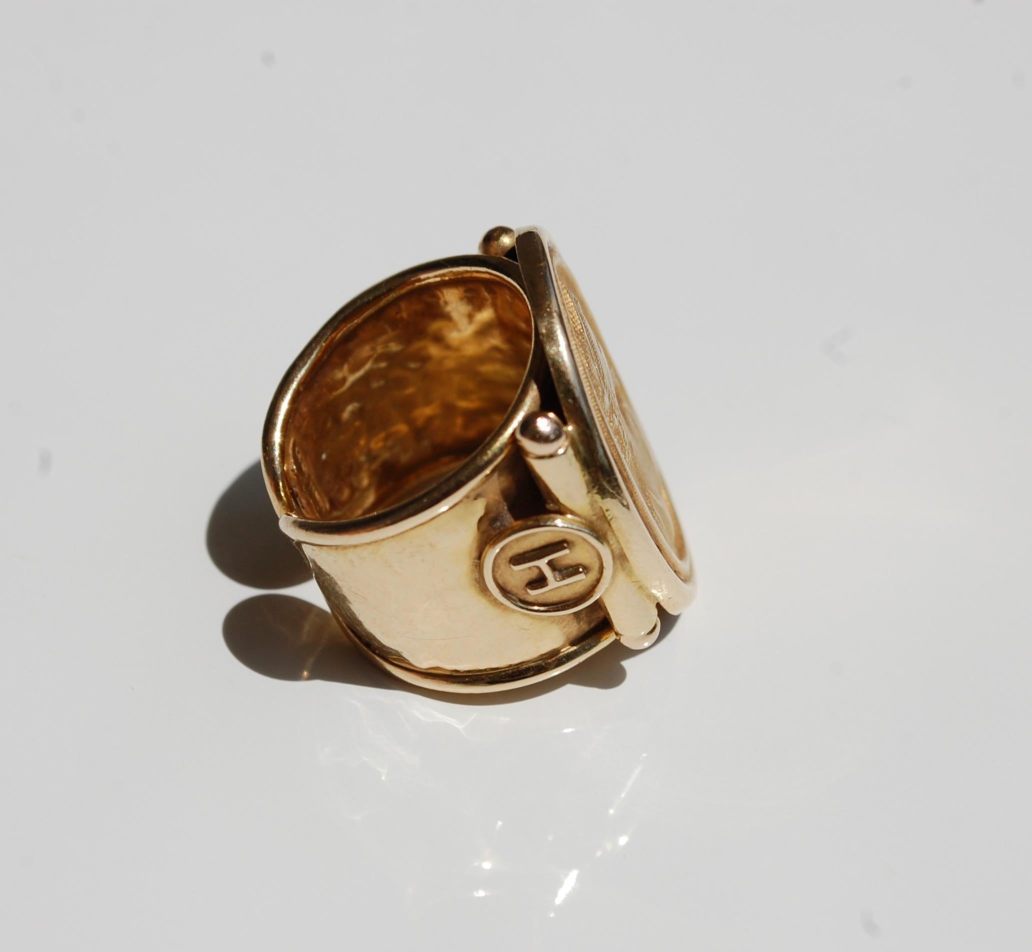 Italian 14K yellow gold cameo intaglio adjastable ring with about 1 inch oval classic Roman young beauty. 
The ring band is wide hand hammered with the letter H on one side, marked 14kg Italy.  Elegant and classy statement ring for every day. Size 7