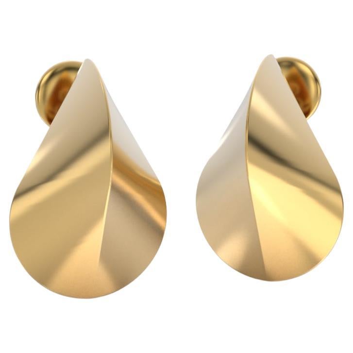 Made to order Oloid-shaped gold earrings, expertly made in Italy by Oltremare Gioielli. Available in  14k gold, each pair exudes sophistication and elegance. With a sleek, polished finish and a modern silhouette measuring 28mm in length and 19mm in