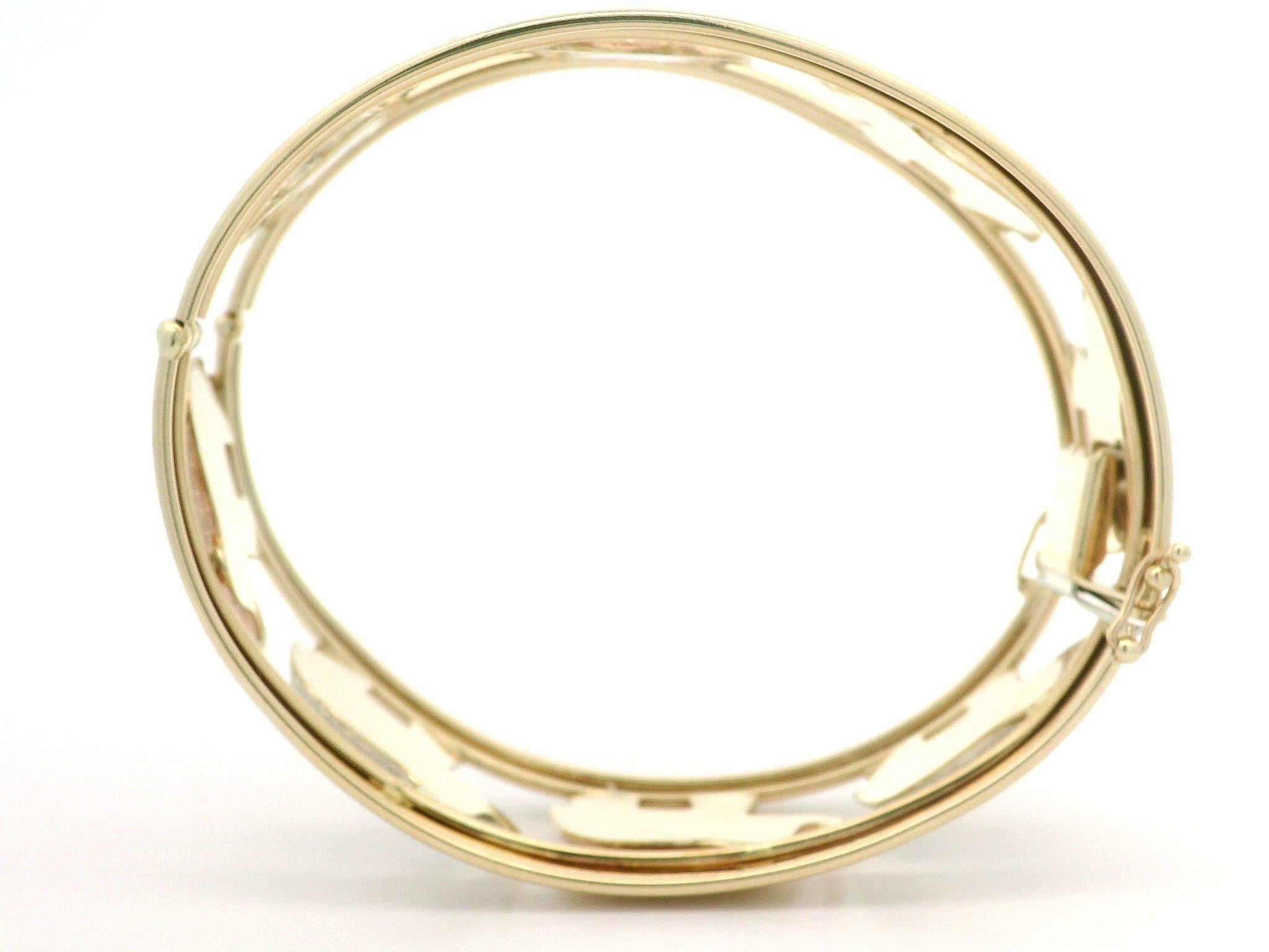 Italian 14k Tri Color Gold Open Work Polished & Textured Elephant Hinged Bangle For Sale 1