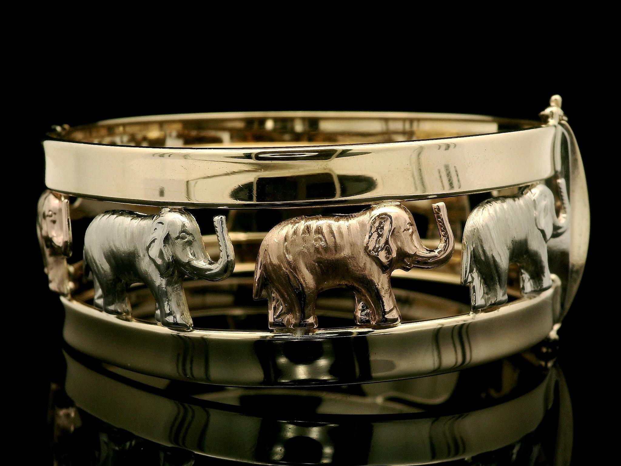 Italian 14k Tri Color Gold Open Work Polished & Textured Elephant Hinged Bangle For Sale 3
